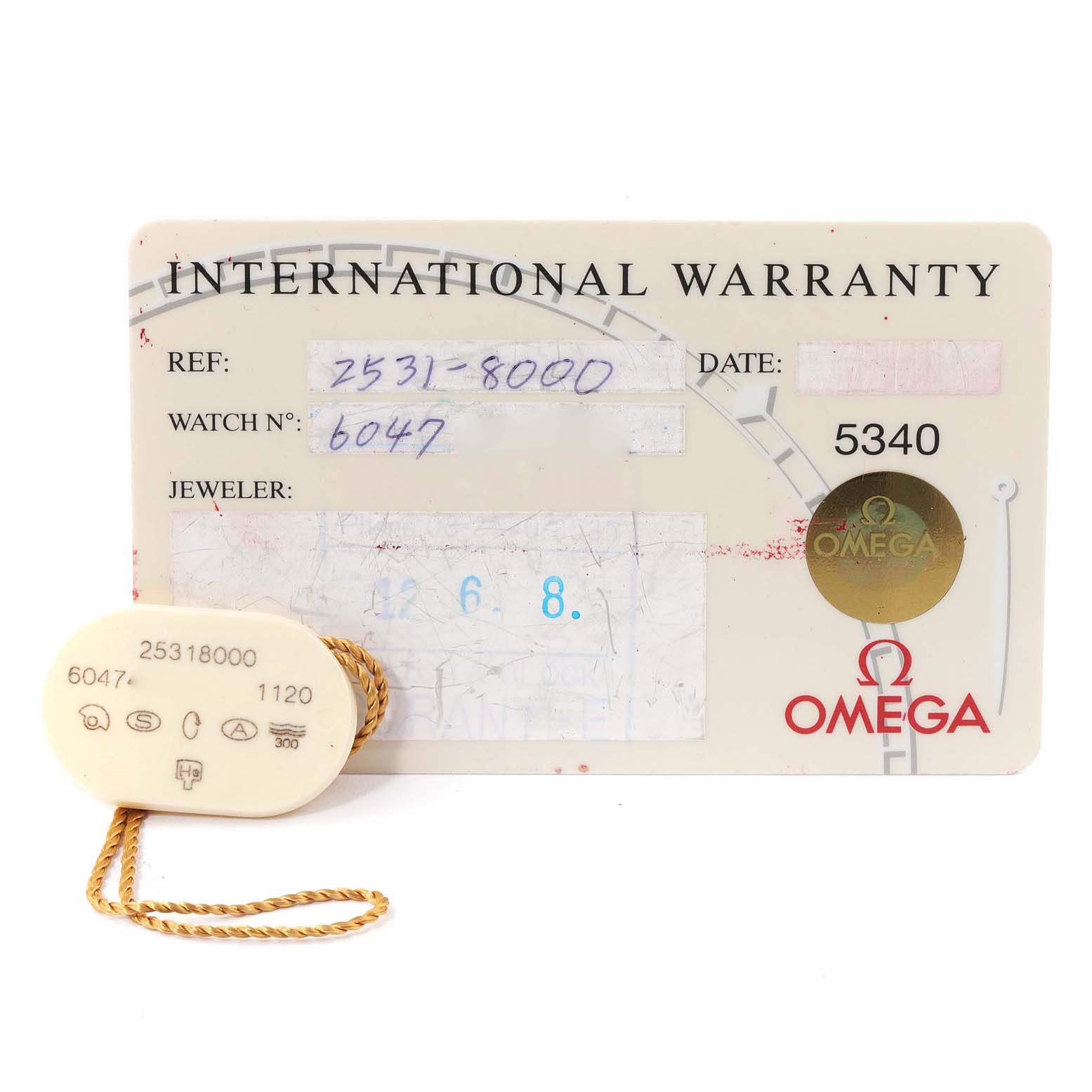 The image shows an Omega Seamaster 2531.80.00 Men's Stainless Steel Blue Dial 2531.80.00 Men's Stainless Steel Blue Dial International Warranty card and an associated tag.