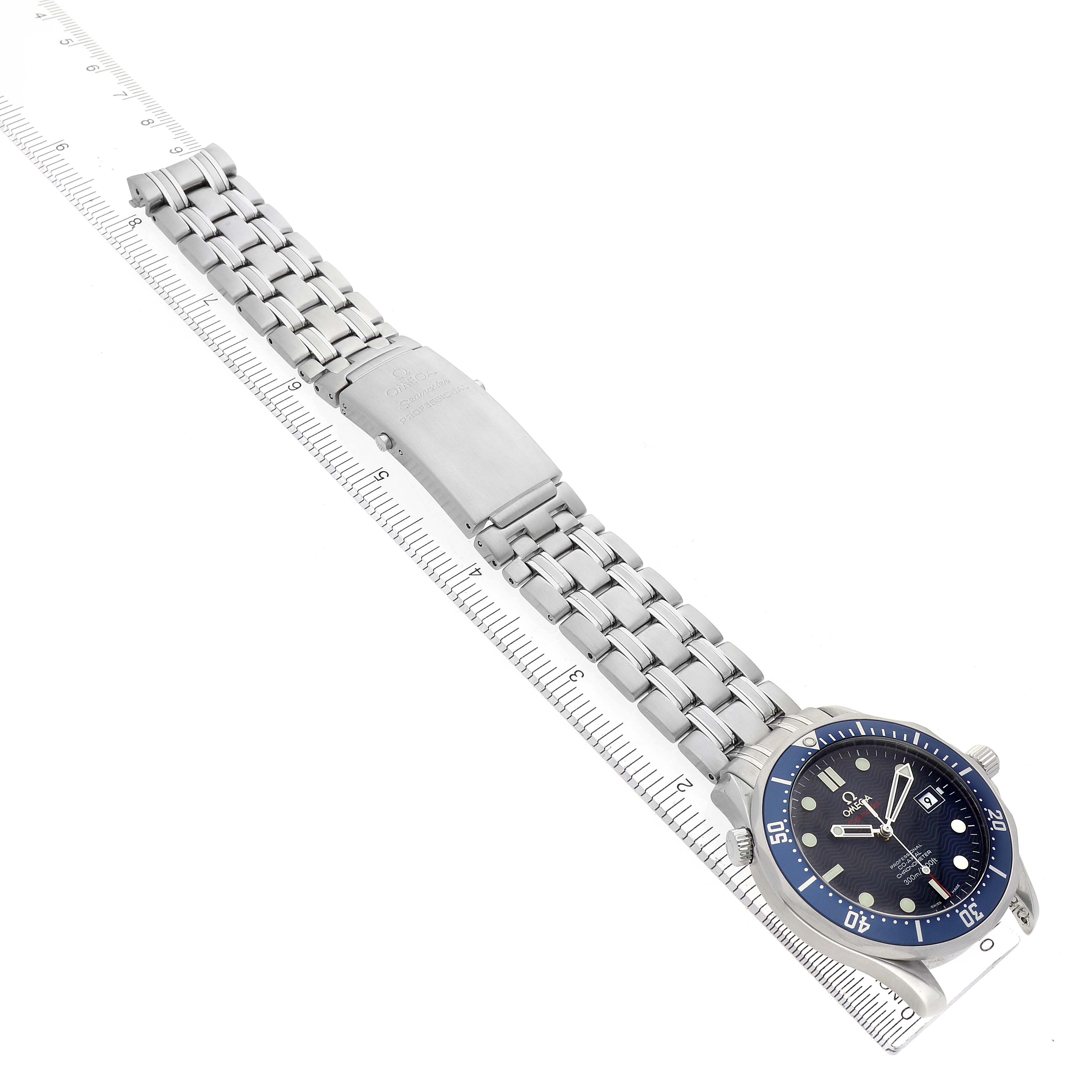 The Omega Seamaster 2220.80.00 Men
s Stainless Steel Blue Dial 2220.80.00 Men
s Stainless Steel Blue Dial watch is shown from an elevated angle, displaying the face, bezel, bracelet, and clasp.