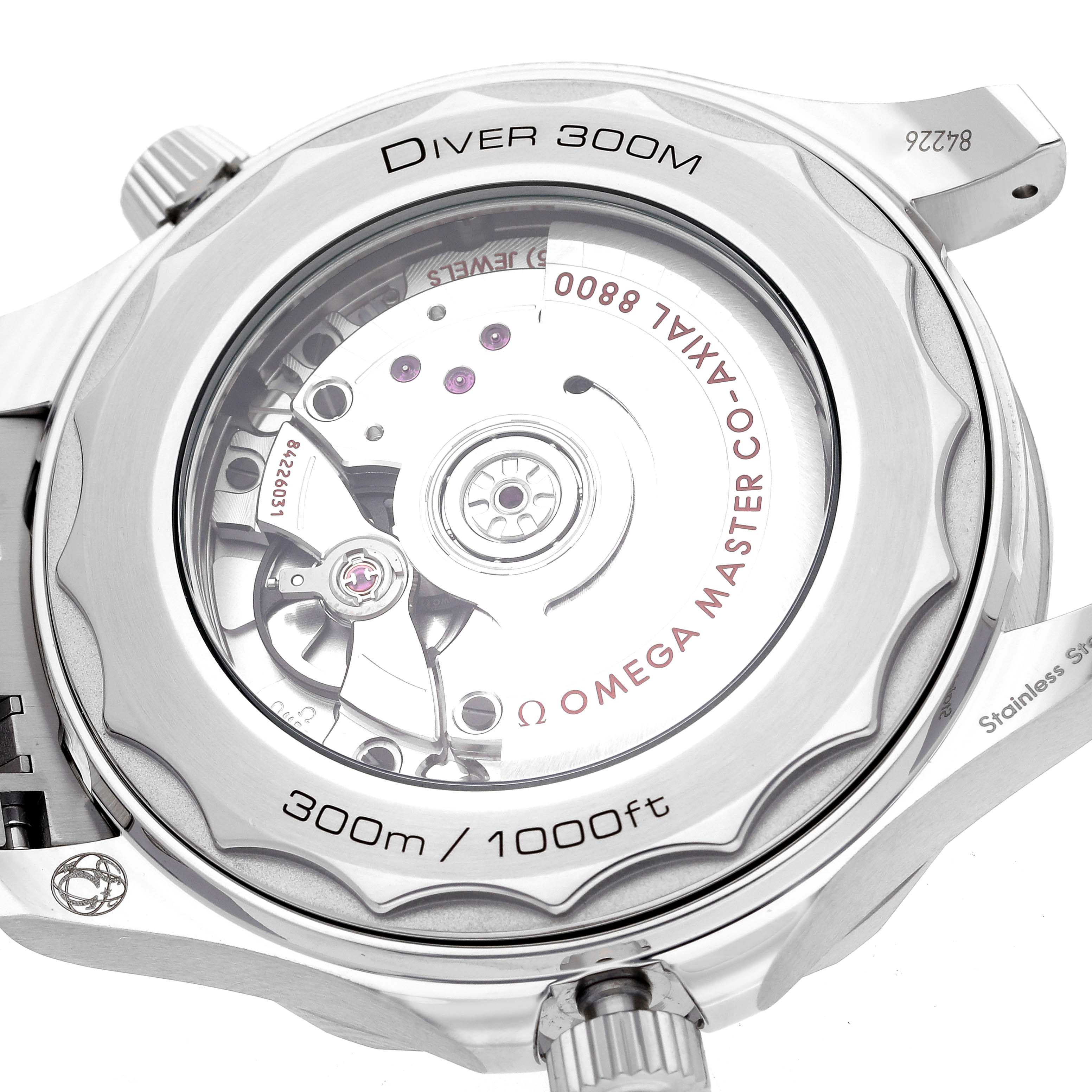 The image shows the back view of the Omega Seamaster 210.30.42.20.03.001 Men
s Stainless Steel Blue Dial 210.30.42.20.03.001 Men
s Stainless Steel Blue Dial Diver 300M watch, highlighting its movement and case details.