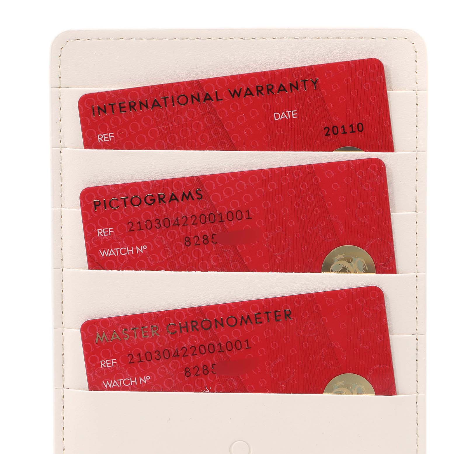 The image displays warranty and certification cards for the Omega Seamaster 210.30.42.20.01.001 Men's Stainless Steel Black Dial 210.30.42.20.01.001 Men's Stainless Steel Black Dial model, placed in a white cardholder.