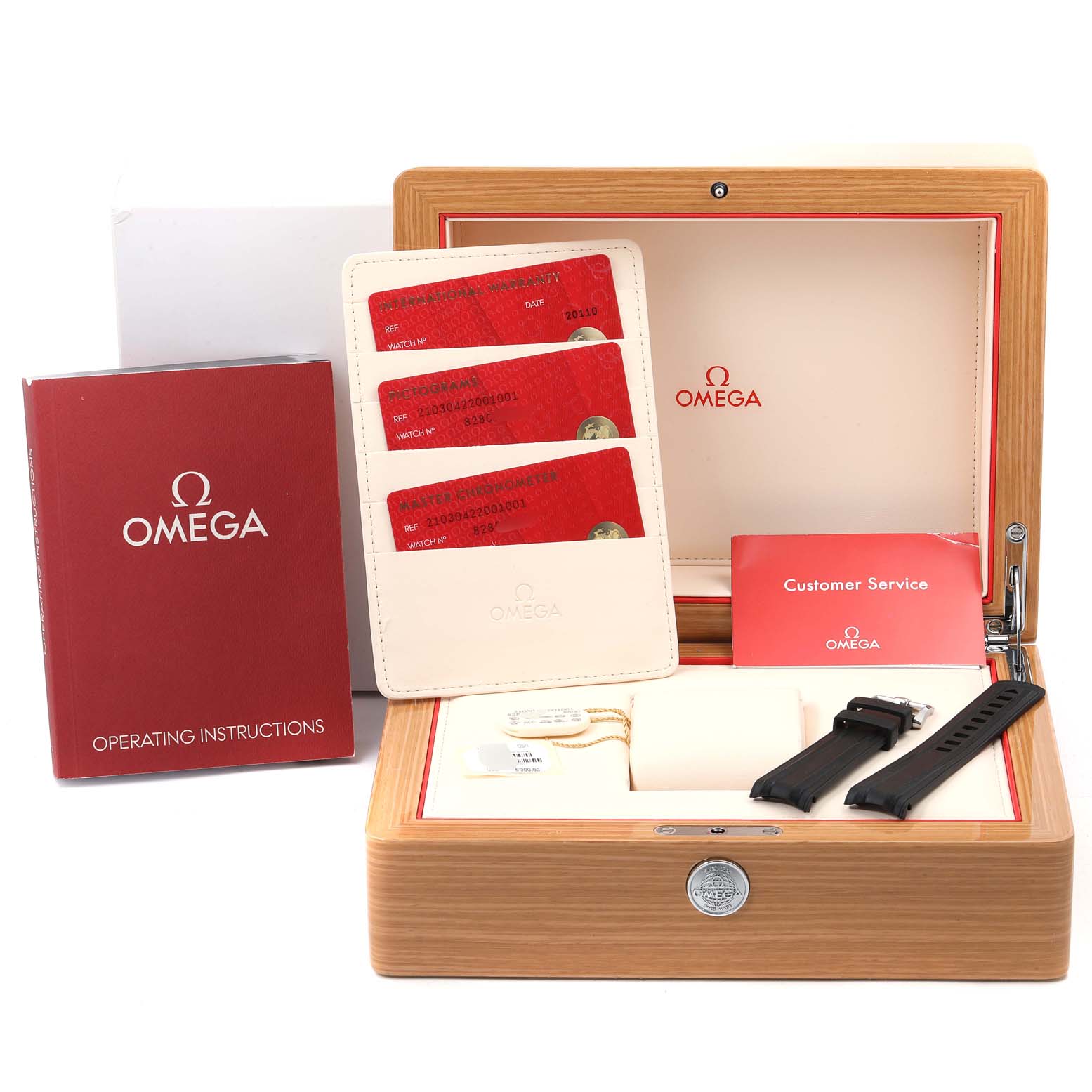 The image shows an Omega Seamaster 210.30.42.20.01.001 Men's Stainless Steel Black Dial 210.30.42.20.01.001 Men's Stainless Steel Black Dial watch box, instruction booklets, warranty cards, and extra watch straps from a straight-on angle.