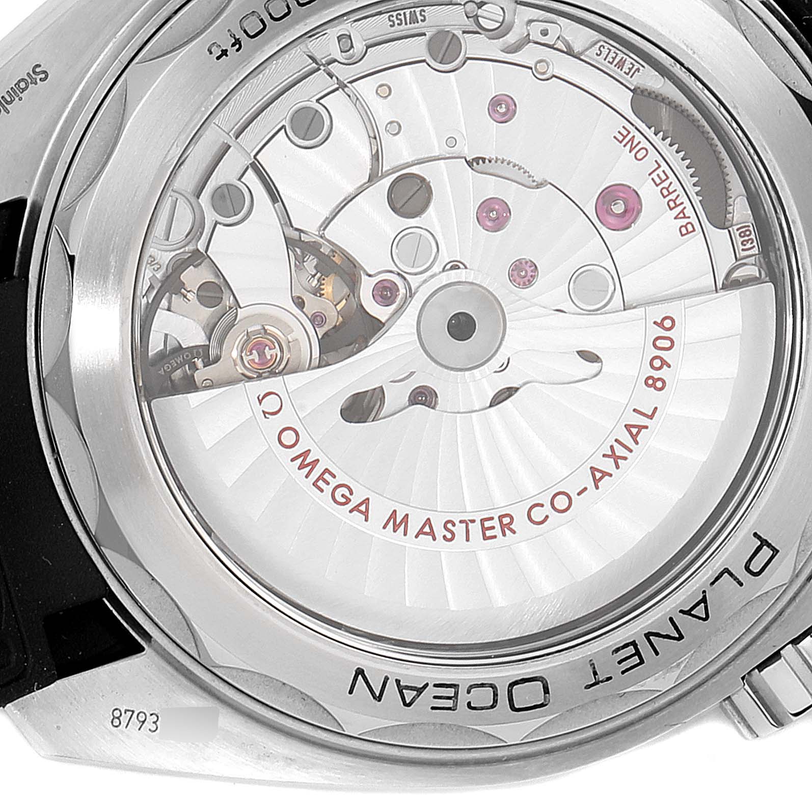 This image shows the backside of an Omega Planet Ocean 215.33.44.22.03.001 Men's Stainless Steel Black Dial 215.33.44.22.03.001 Men's Stainless Steel Black Dial watch, highlighting its Omega Master Co-Axial 8906 movement.