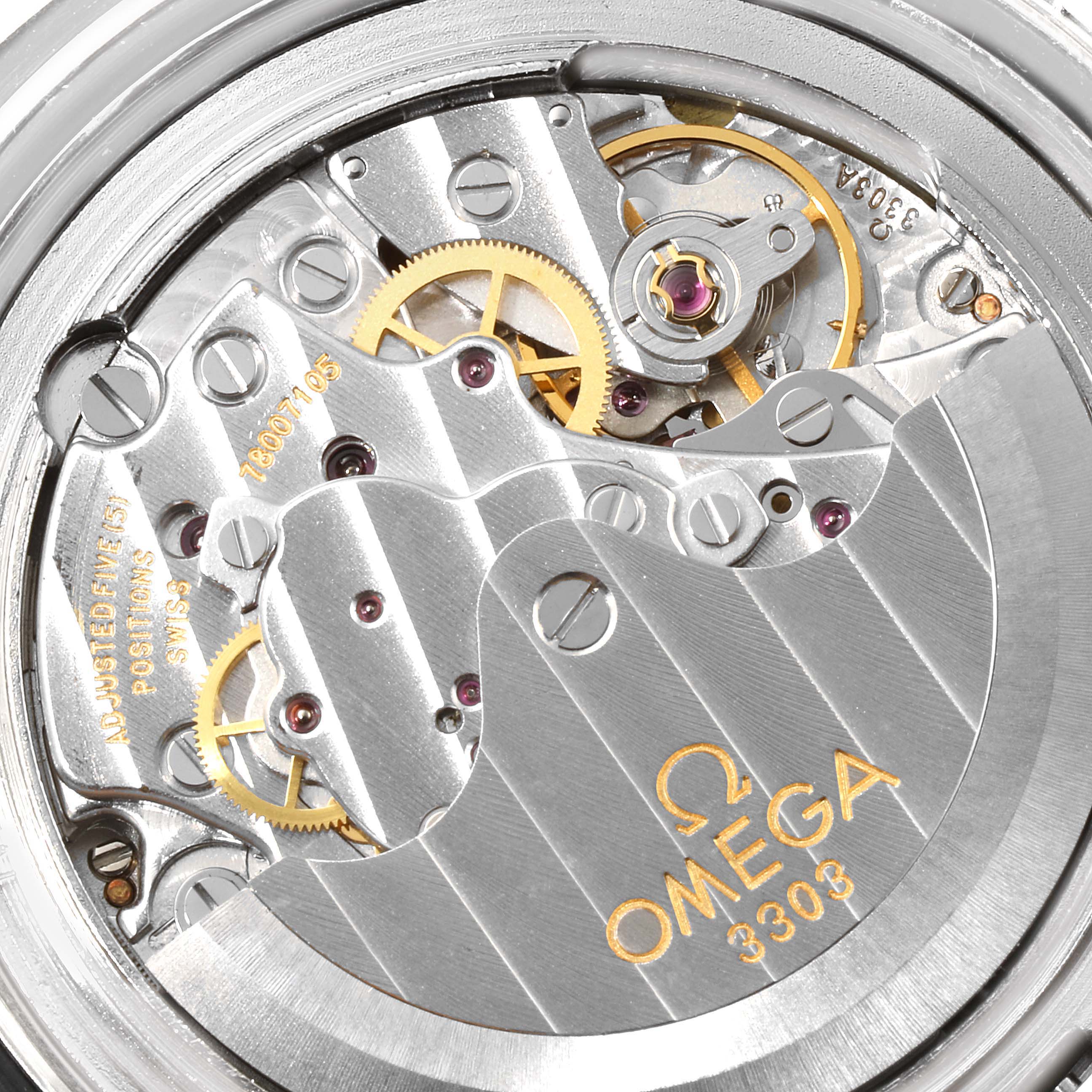 This close-up image shows the intricate movement and components of the Omega Speedmaster 3551.20.00 Men's Stainless Steel White Dial 3551.20.00 Men's Stainless Steel White Dial watch model.