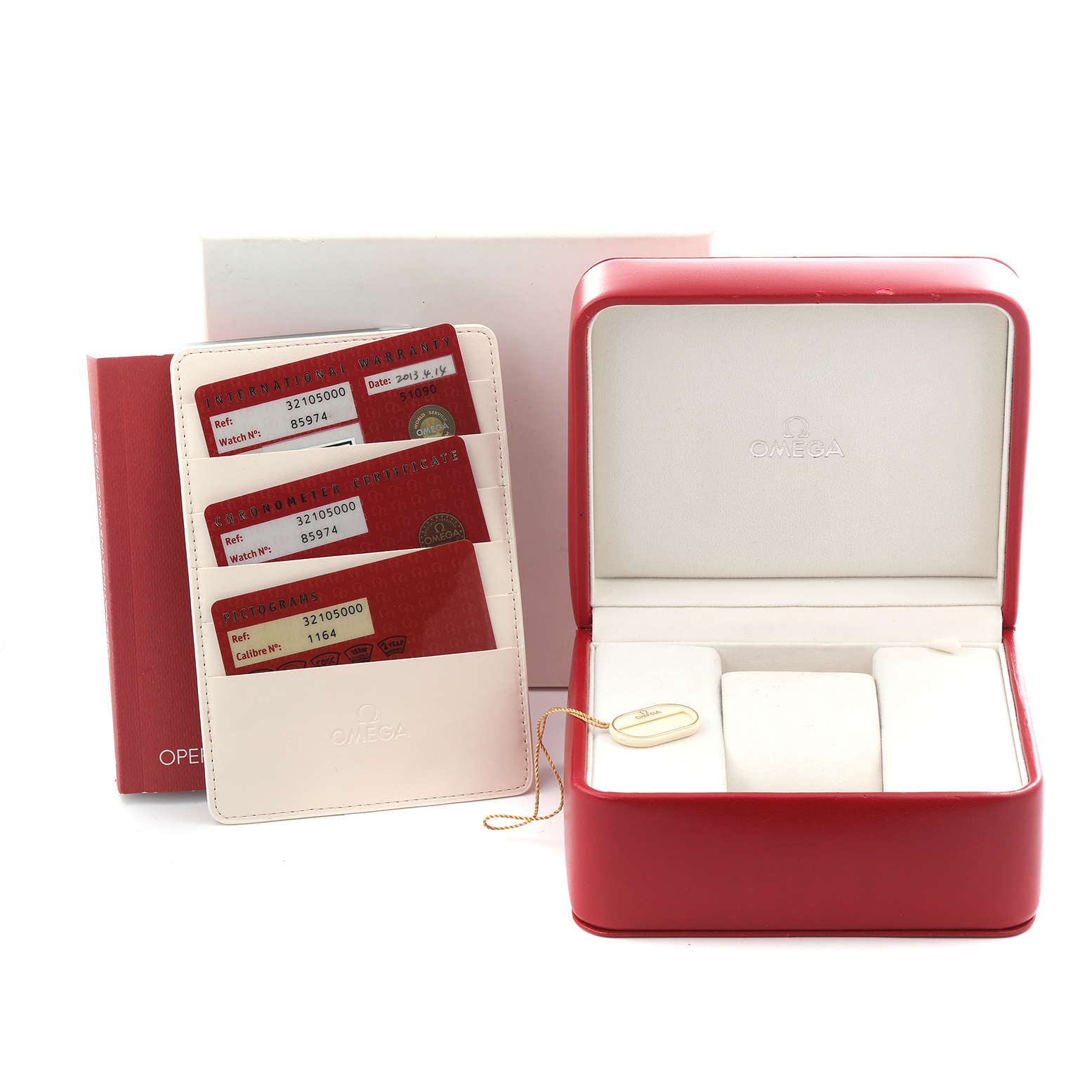 The image shows an Omega Speedmaster 3210.50.00 Men
s Stainless Steel Black Dial 3210.50.00 Men
s Stainless Steel Black Dial box, display cards, and a tag from a front angle.