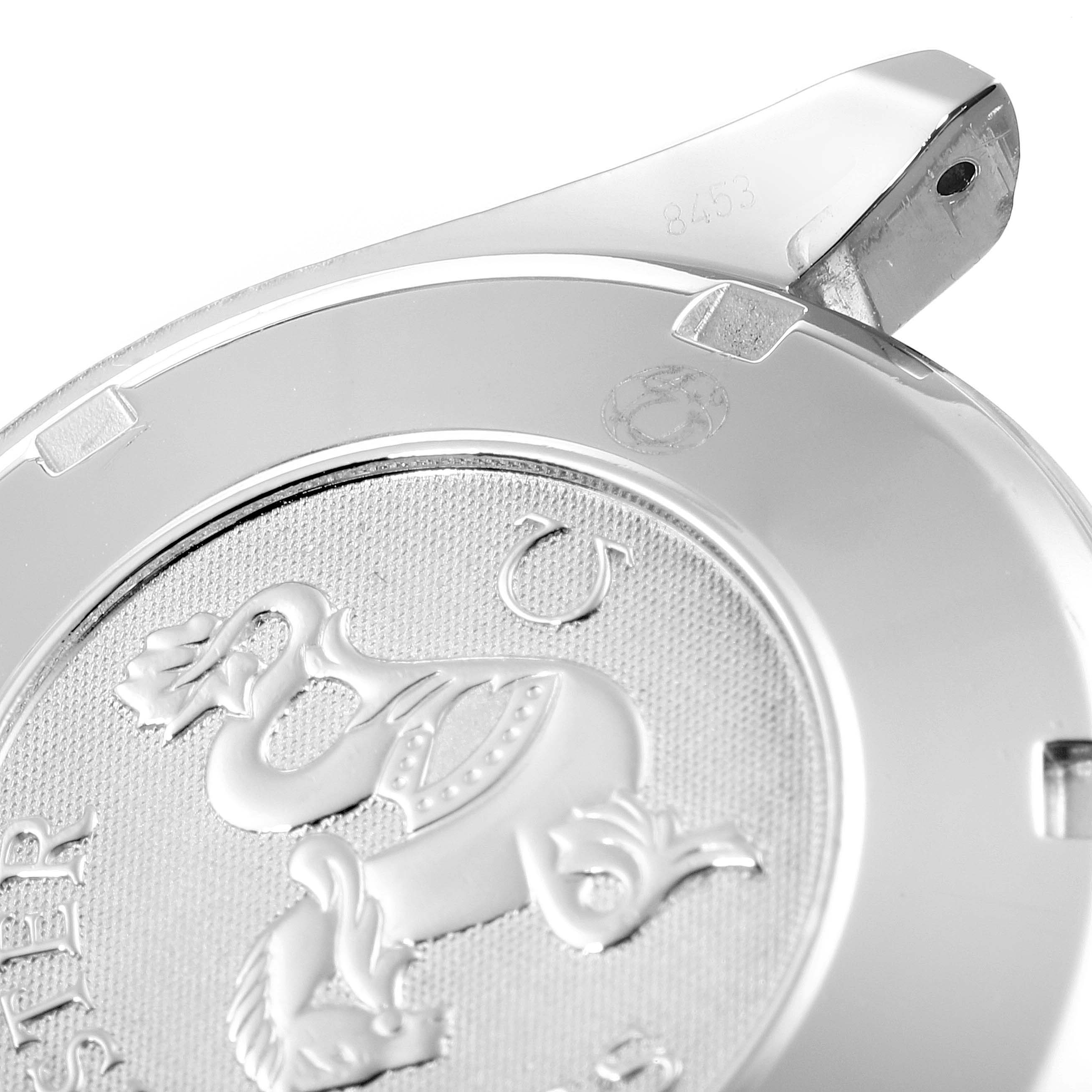 This image shows the case back of an Omega Speedmaster 3222.80.00 Men's Stainless Steel Blue Dial 3222.80.00 Men's Stainless Steel Blue Dial watch, viewed at a close-up angle.