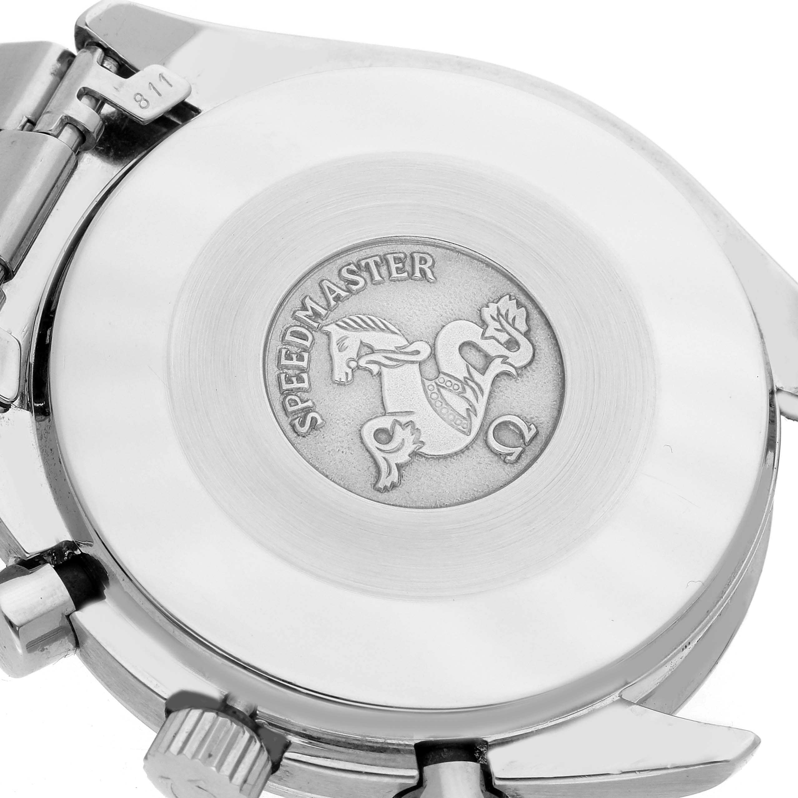 The image shows the back case of an Omega Speedmaster 3510.20.00 Men's Stainless Steel White Dial 3510.20.00 Men's Stainless Steel White Dial watch, highlighting the engraved emblem and brand name.