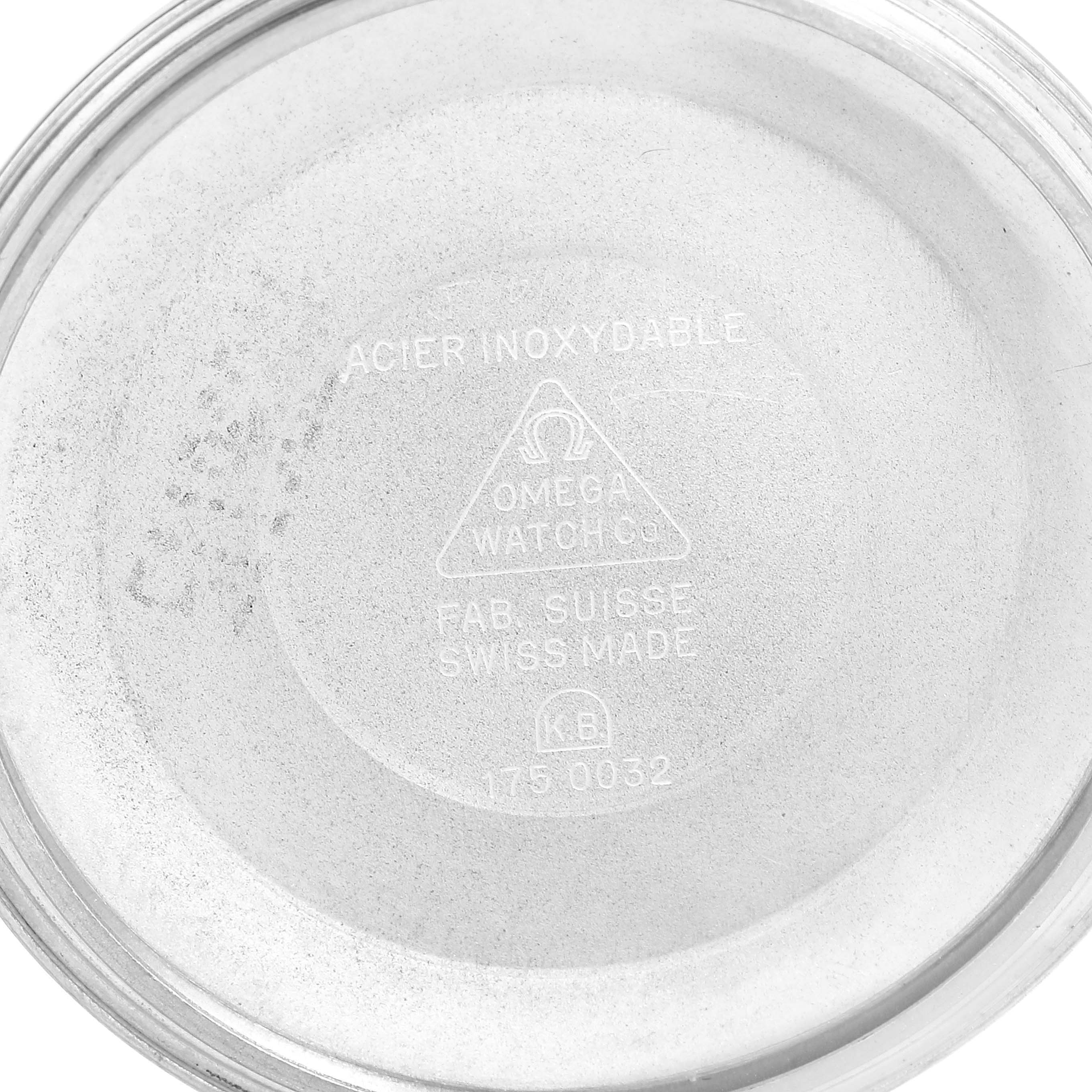 This is the inner case back of an Omega Speedmaster 3310.10.00 Men's Steel and Gold (two tone) Champagne Dial 3310.10.00 Men's Steel and Gold (two tone) Champagne Dial watch, showing the brand's hallmark and model details.