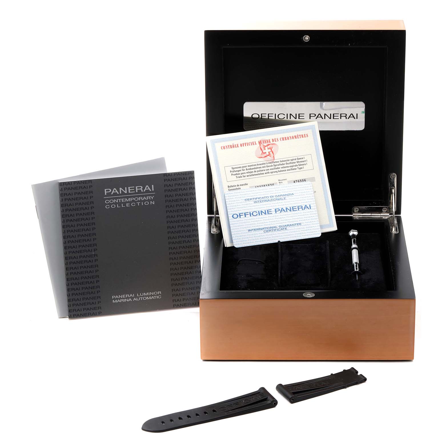 The image shows Panerai Luminor PAM00104 Men's Stainless Steel Black Dial PAM00104 Men's Stainless Steel Black Dial watch accessories, including a box, manual, additional straps, and certification from a top-front angle.