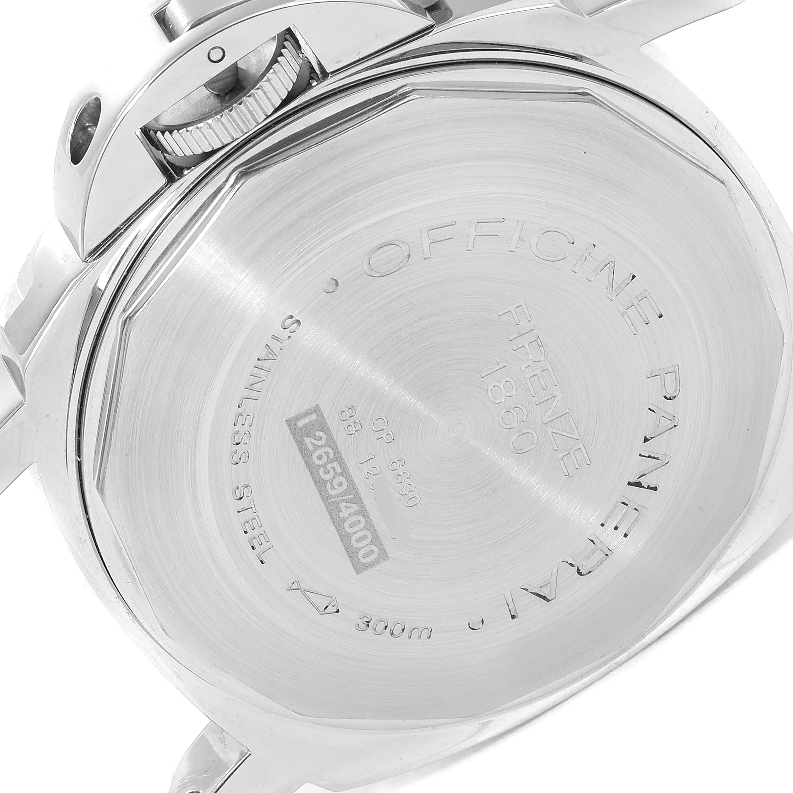 The image shows the back case of a Panerai Luminor PAM00104 Men's Stainless Steel Black Dial PAM00104 Men's Stainless Steel Black Dial watch, highlighting its engraved details and crown guard.