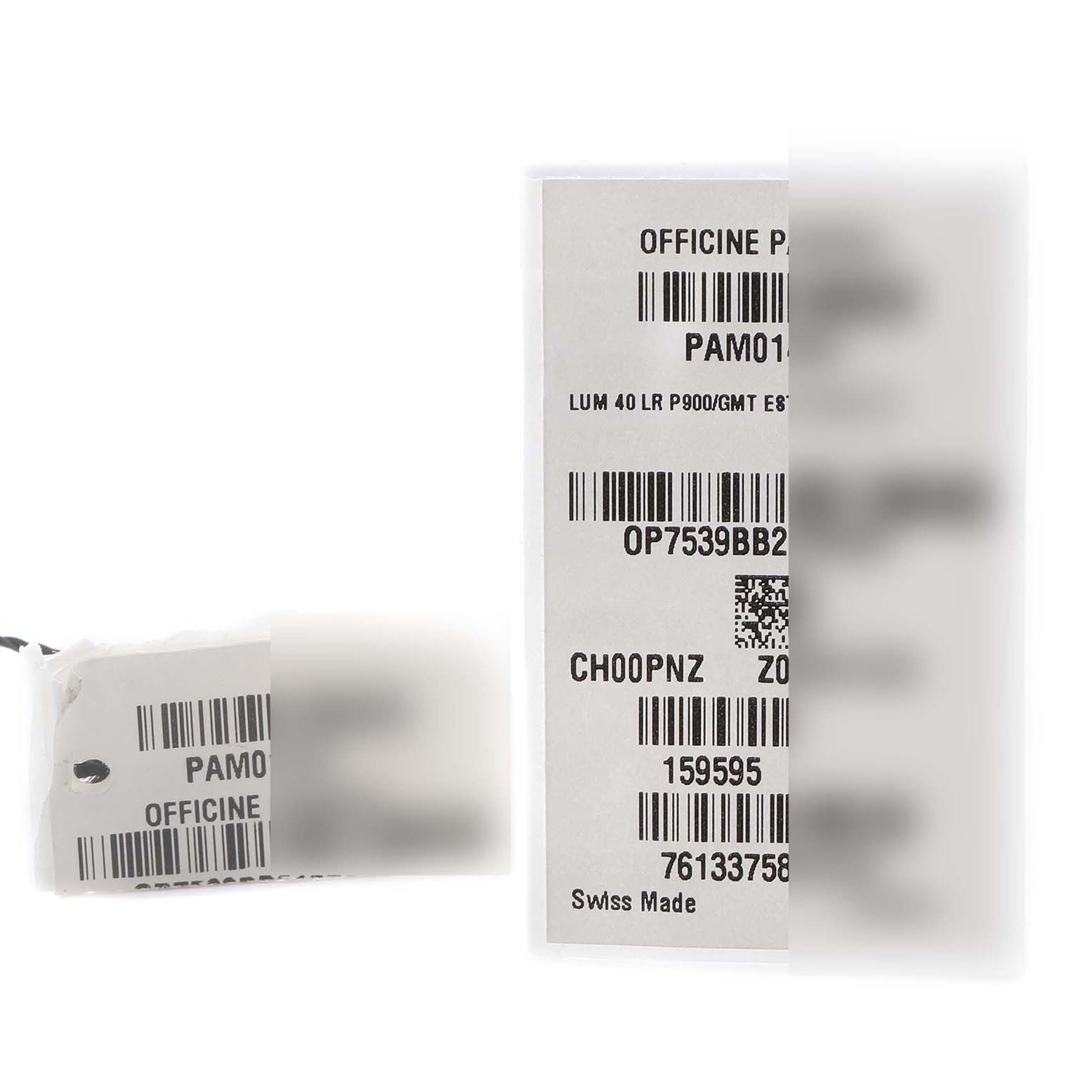 The image shows tags and labels with barcode details for a Panerai Luminor PAM01404 Men
s Stainless Steel Blue Dial PAM01404 Men
s Stainless Steel Blue Dial watch model.