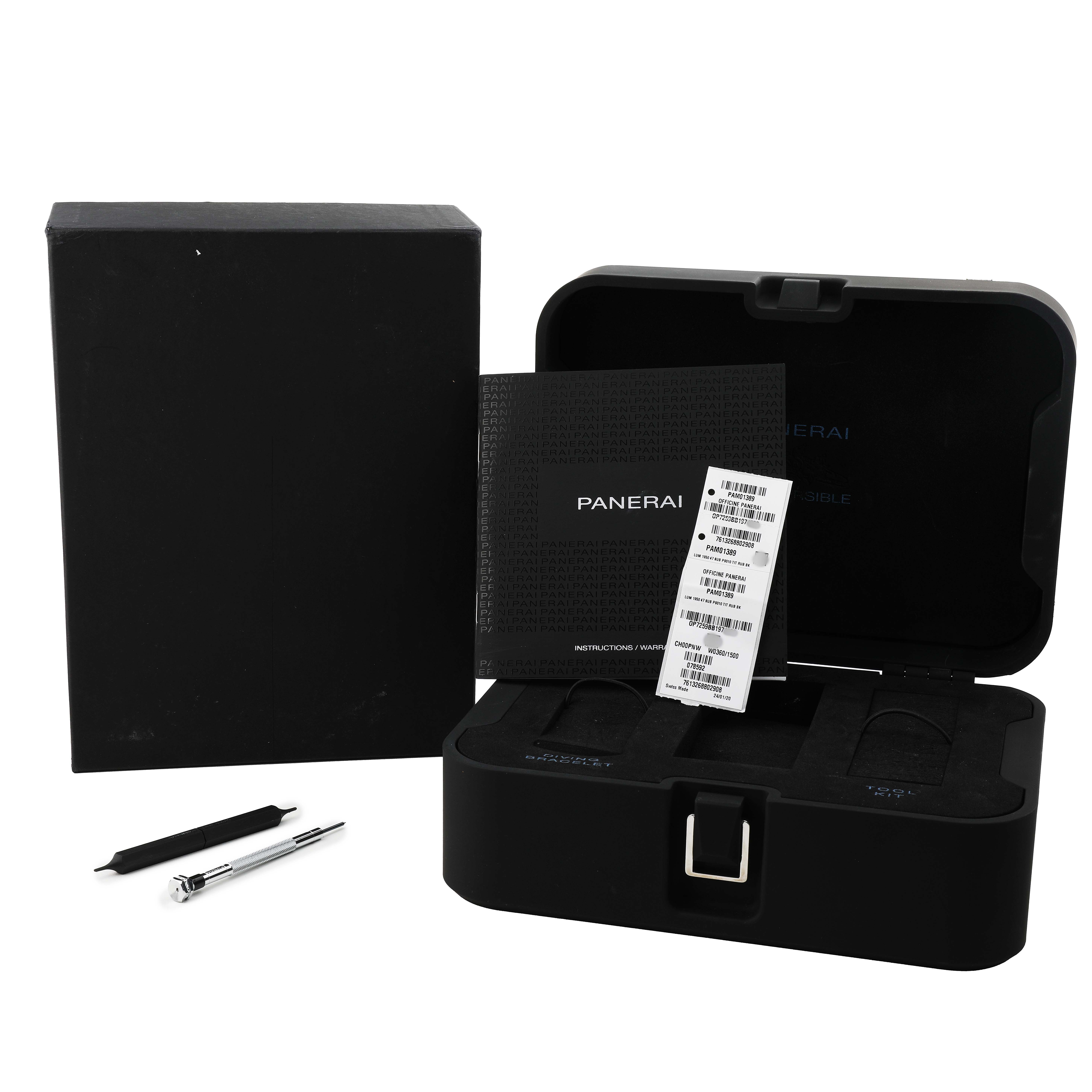 The Panerai Submersible PAM01389 Men's Titanium Black Dial model accessories are displayed with an open box, instruction manual, and tools.