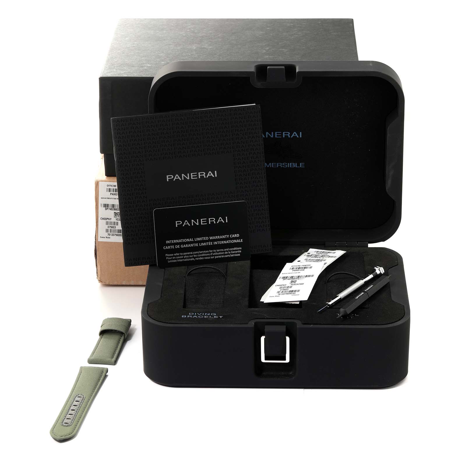 The image shows a Panerai Submersible PAM01226 Men
s Stainless Steel White Dial PAM01226 Men
s Stainless Steel White Dial watch case with manuals, an extra strap, warranty card, and a tool, viewed from above.