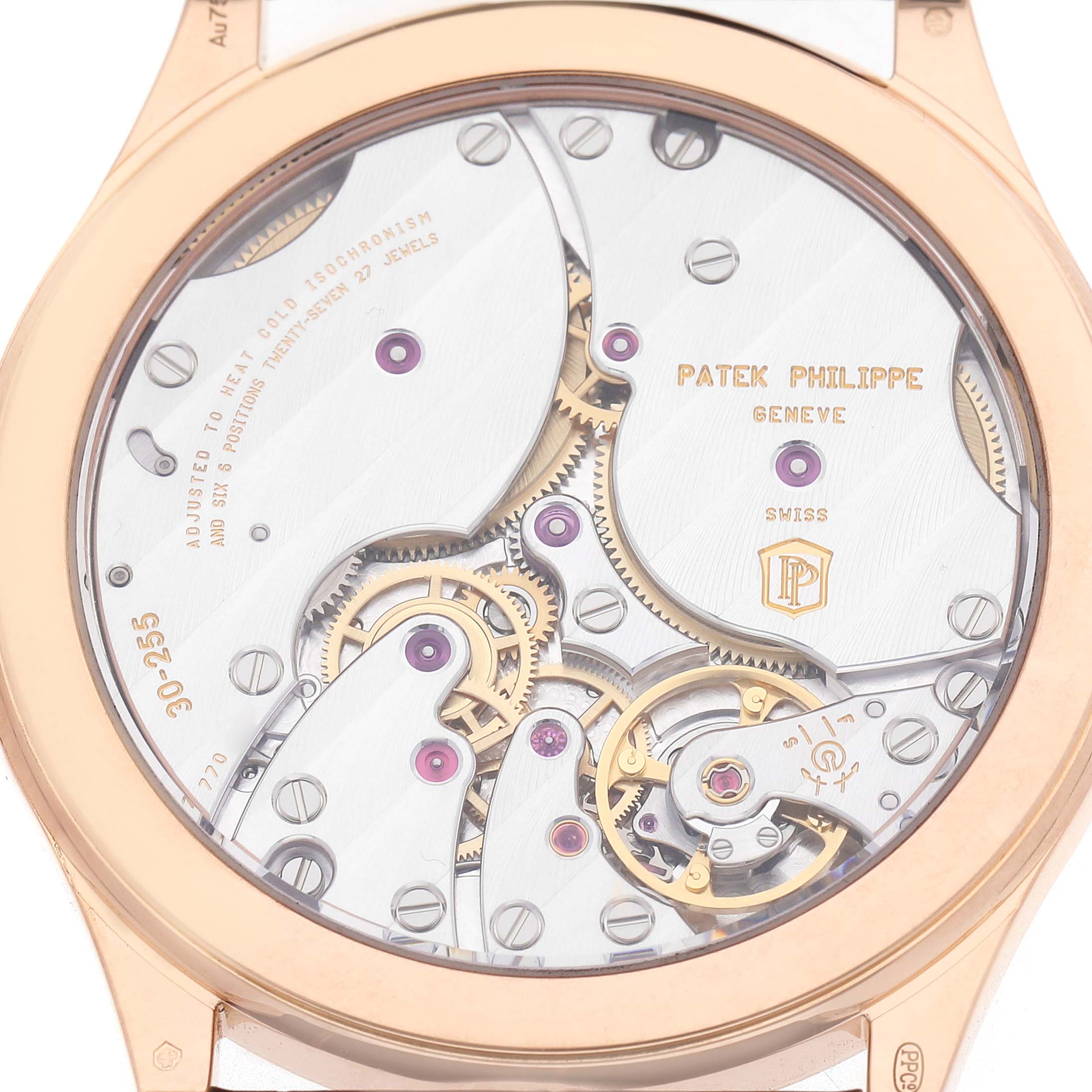 This image shows the back of the Patek Philippe Calatrava 6119 6119R Men's Rose Gold Silver Dial watch, highlighting the intricate mechanics and movement parts.