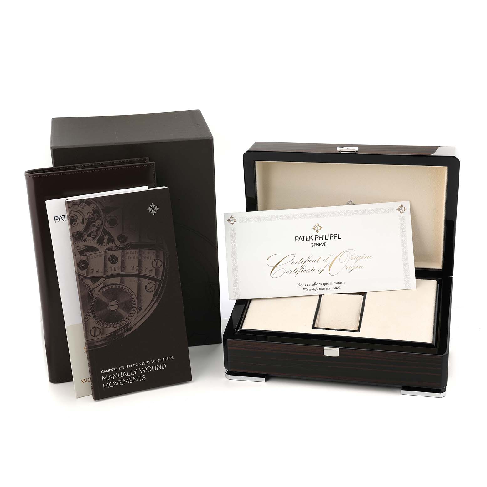 The image shows a Patek Philippe Calatrava 6119 6119R Men's Rose Gold Silver Dial watch box, booklet, and certificate from a frontal angle.