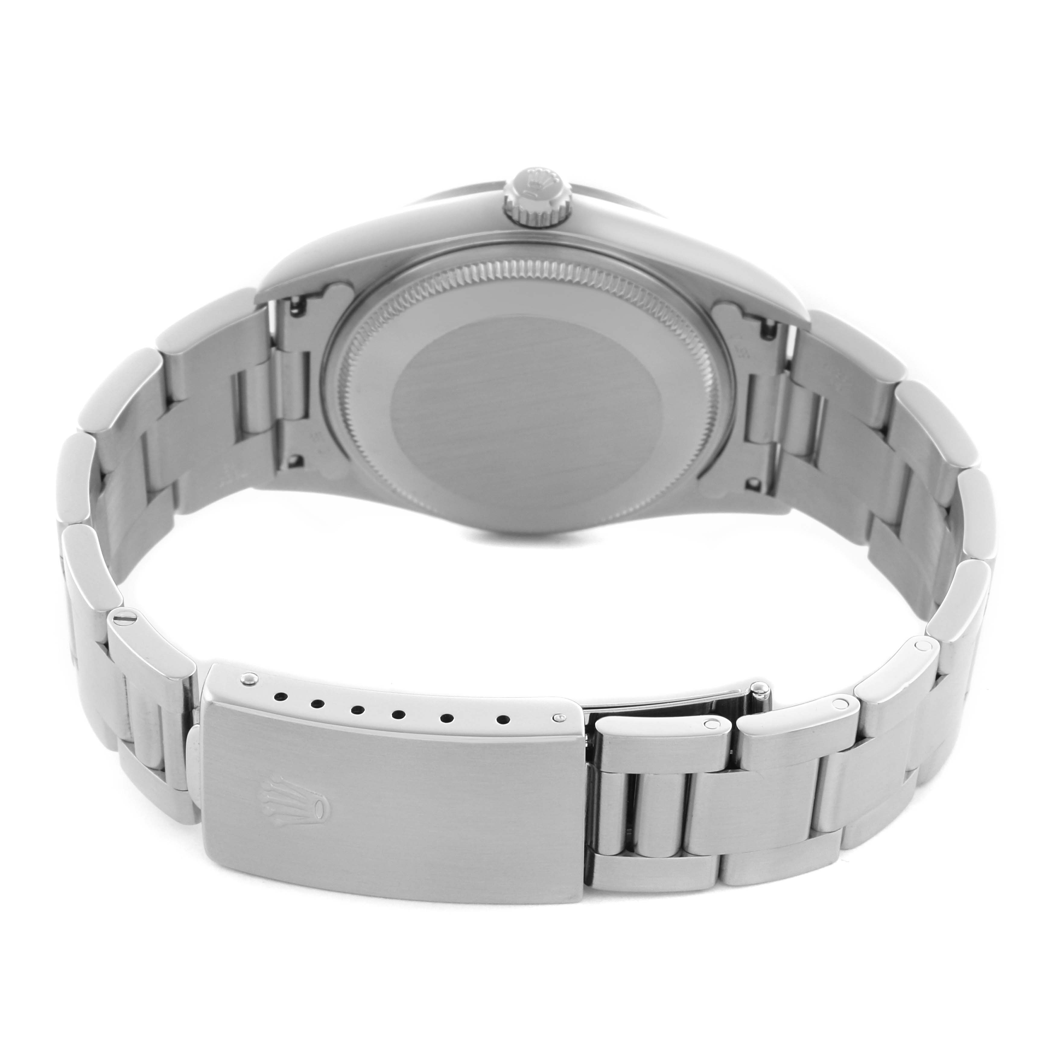 The image shows a Rolex Air-King 14000M Men's Stainless Steel Silver Dial 14000M Men's Stainless Steel Silver Dial watch from the back, highlighting its case, bracelet, and clasp.