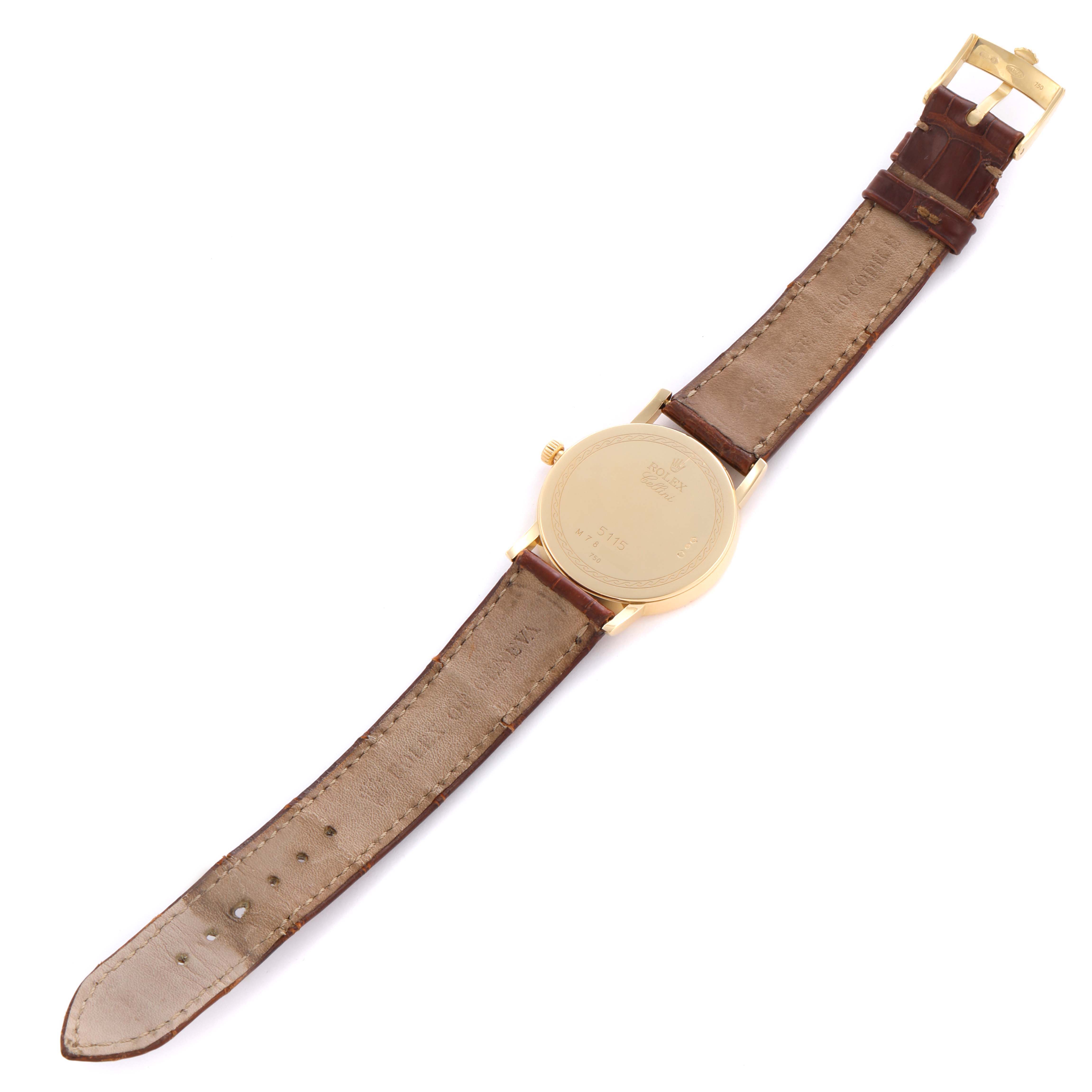 The Rolex Cellini 5115 Men's Yellow Gold Mother of Pearl Dial 5115 Men's Yellow Gold Mother of Pearl Dial watch is shown from the back, displaying the case back, strap, and buckle in a top-down angle.