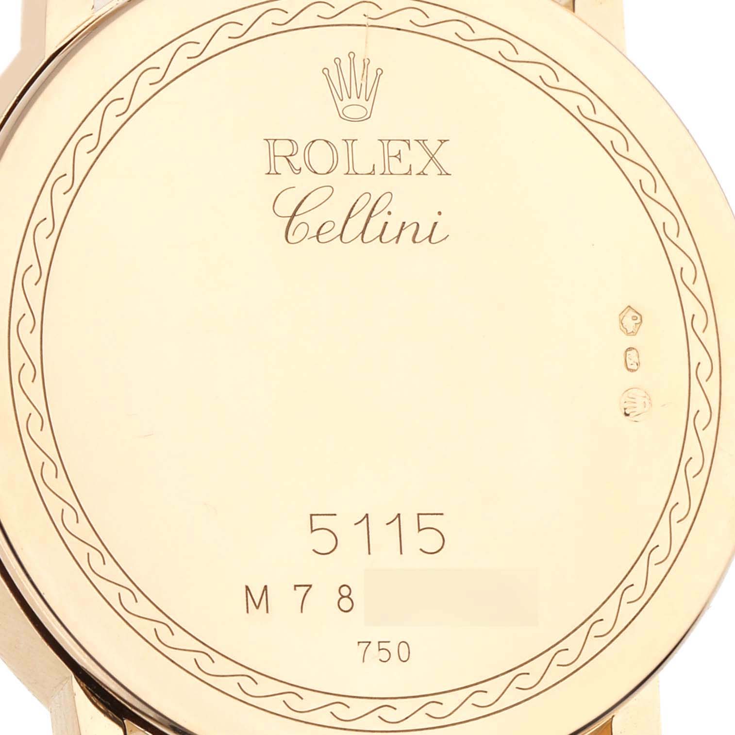 The image shows the back of the Rolex Cellini 5115 Men's Yellow Gold Mother of Pearl Dial 5115 Men's Yellow Gold Mother of Pearl Dial watch, featuring model details and hallmark engravings.