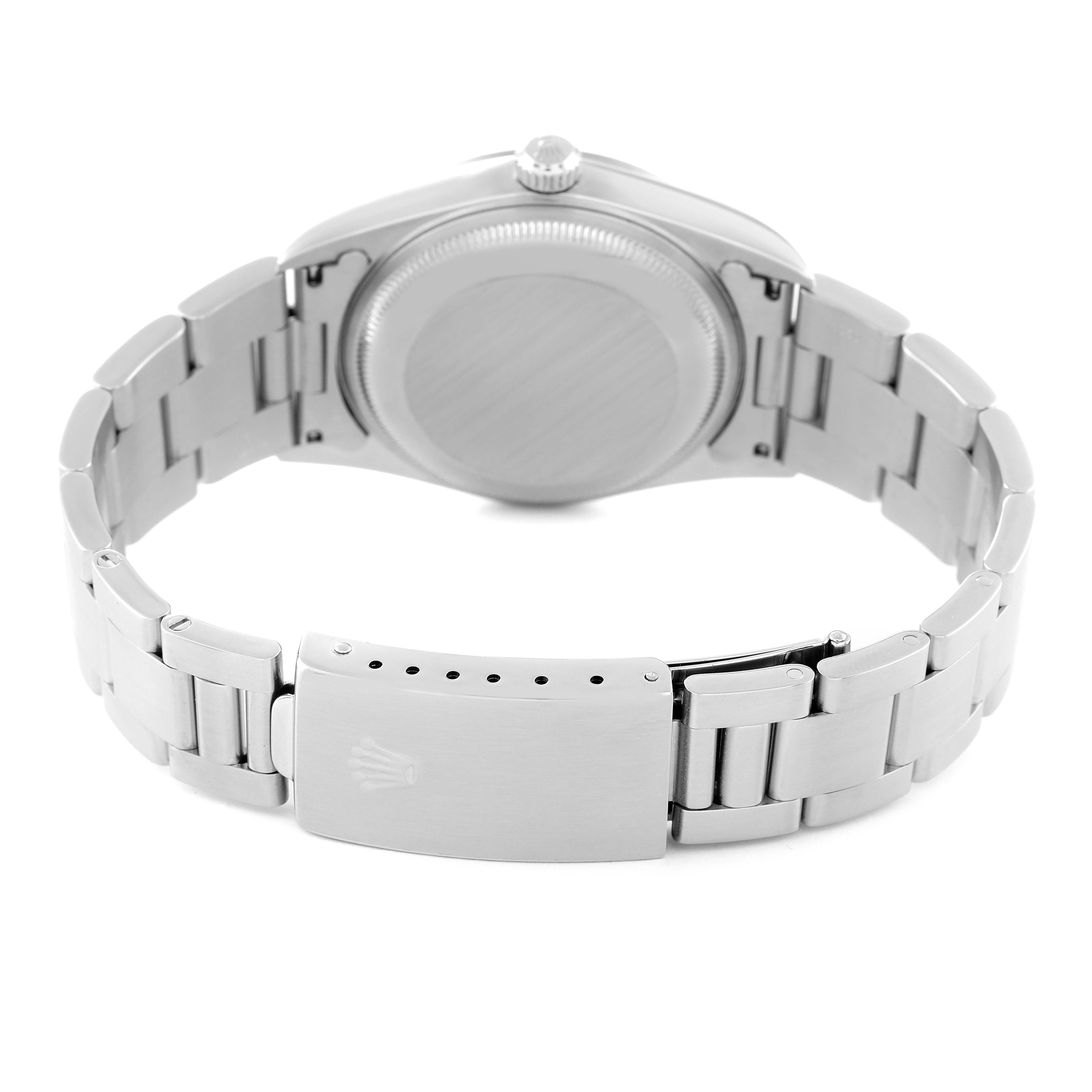 The image shows the back view of a Rolex Date 15200 Men's Stainless Steel Black Dial 15200 Men's Stainless Steel Black Dial model, focusing on the case back and the clasp of the stainless steel bracelet.