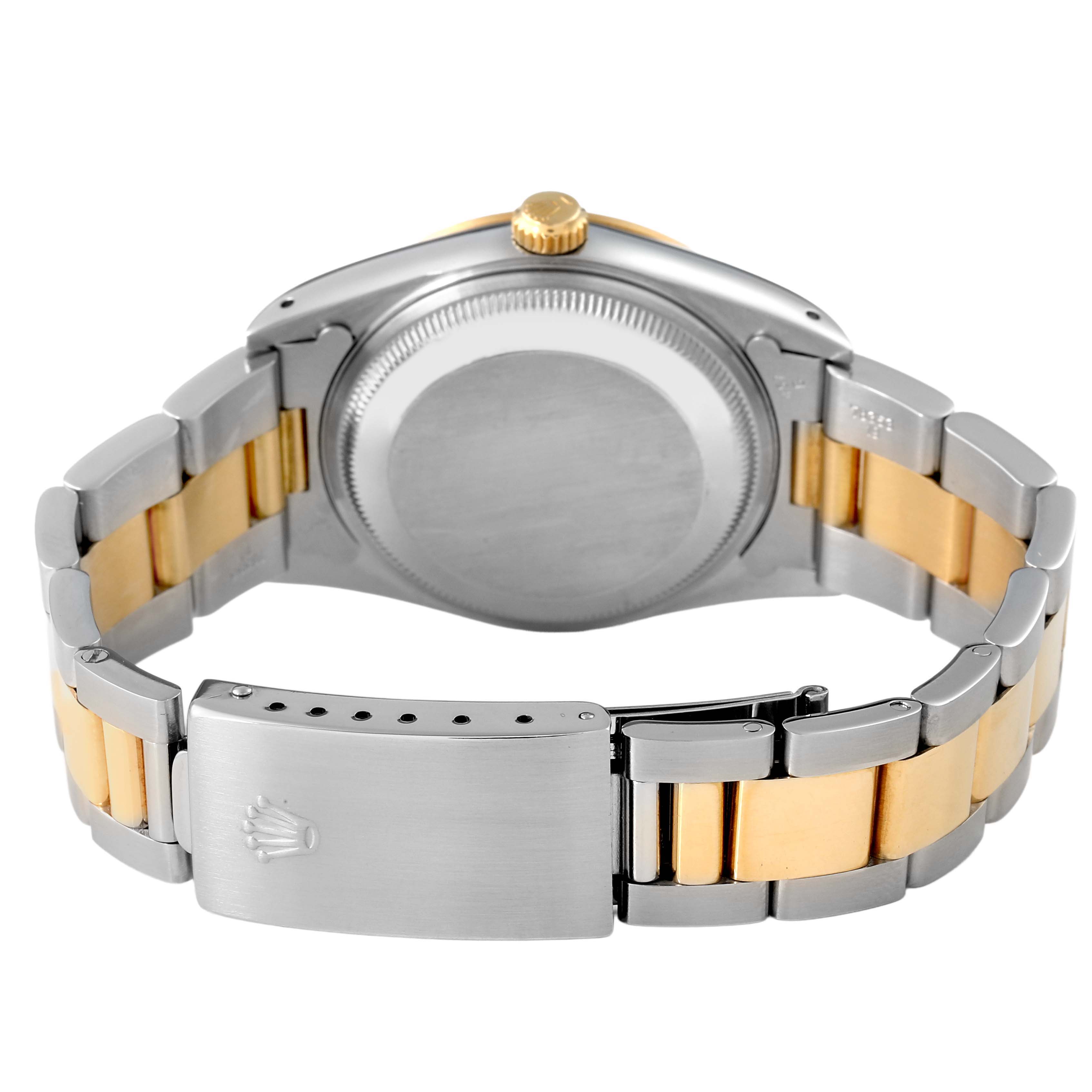 The image shows the back and clasp of a Rolex Date 15223 Men's Steel and Gold (two tone) Champagne Dial watch, highlighting its two-tone metal bracelet.