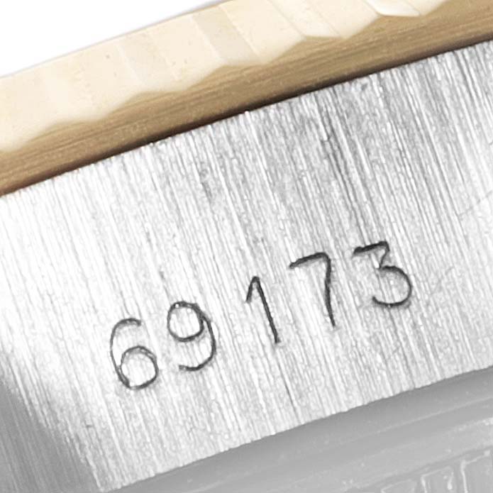 The image shows a close-up of the case with model number inscribed on a Rolex Datejust 69173 Women's Steel and Gold (two tone) Black Dial 69173 Women's Steel and Gold (two tone) Black Dial watch.