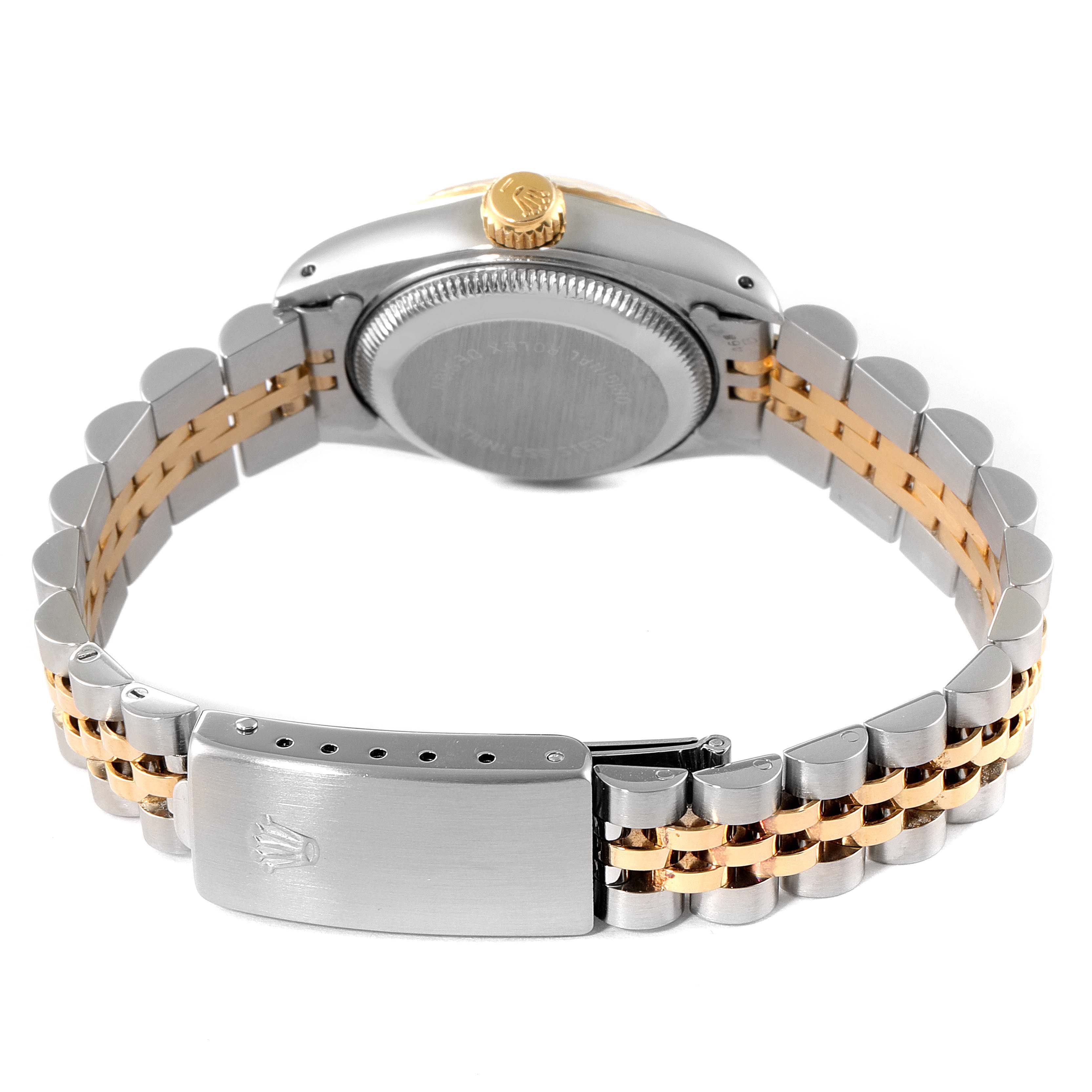 This image shows the back side of the Rolex Datejust 69173 Women's Steel and Gold (two tone) Black Dial 69173 Women's Steel and Gold (two tone) Black Dial with its case back, crown, and two-tone bracelet.