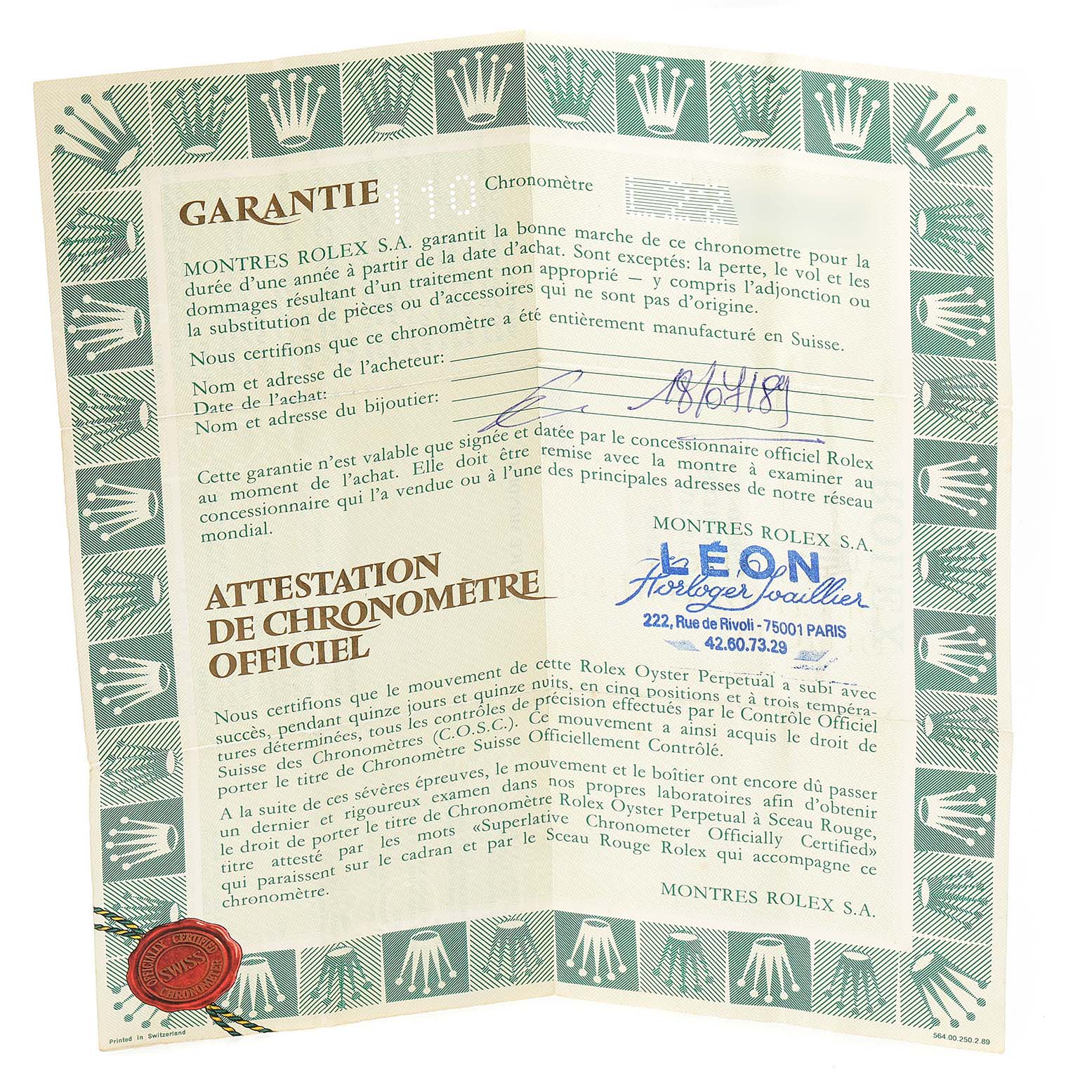 This is the warranty certificate for a Rolex Datejust 69173 Women's Steel and Gold (two tone) Black Dial 69173 Women's Steel and Gold (two tone) Black Dial model, displaying the brand's signature green and emblem.