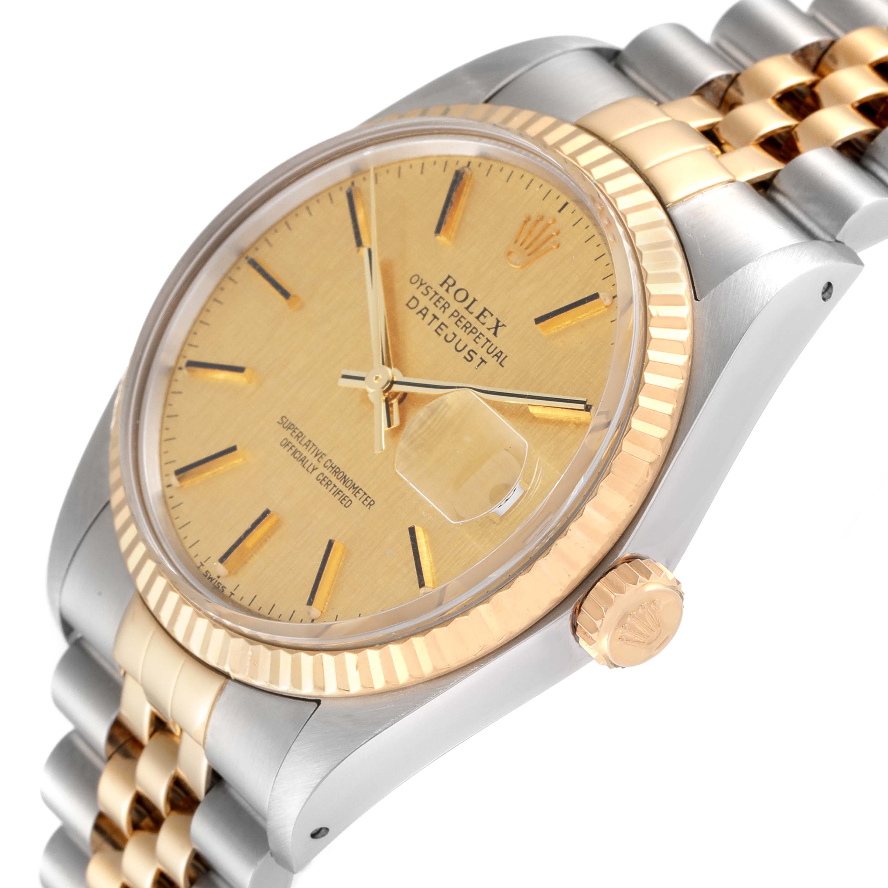 Side angle view of the Rolex Vintage Collection 16013 Men's Steel and Gold (two tone) Champagne Dial 16013 Men's Steel and Gold (two tone) Champagne Dial Datejust model, showing the dial, crown, fluted bezel, and part of the two-tone bracelet.