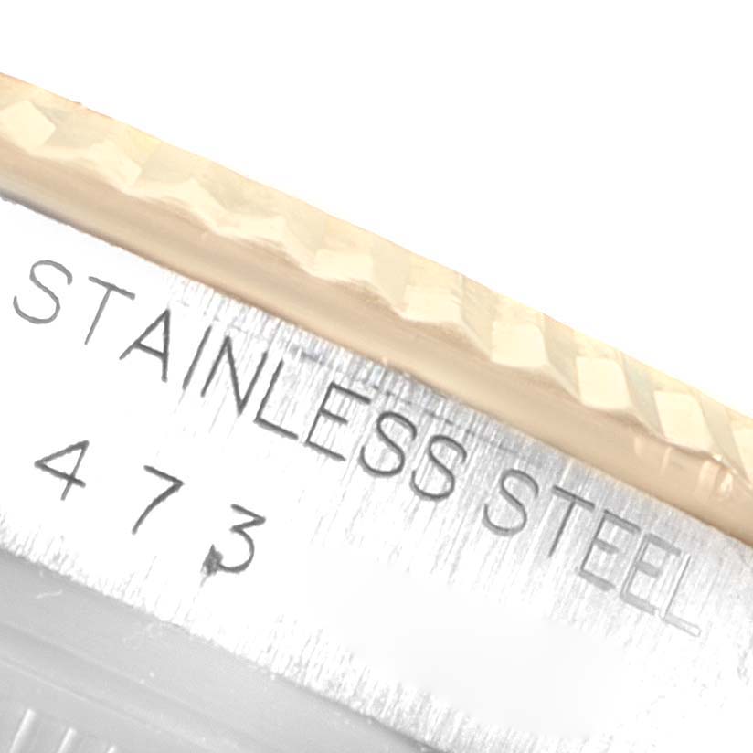 The image shows a close-up angle of the stainless steel case and bezel of the Vintage Collection model by Rolex.