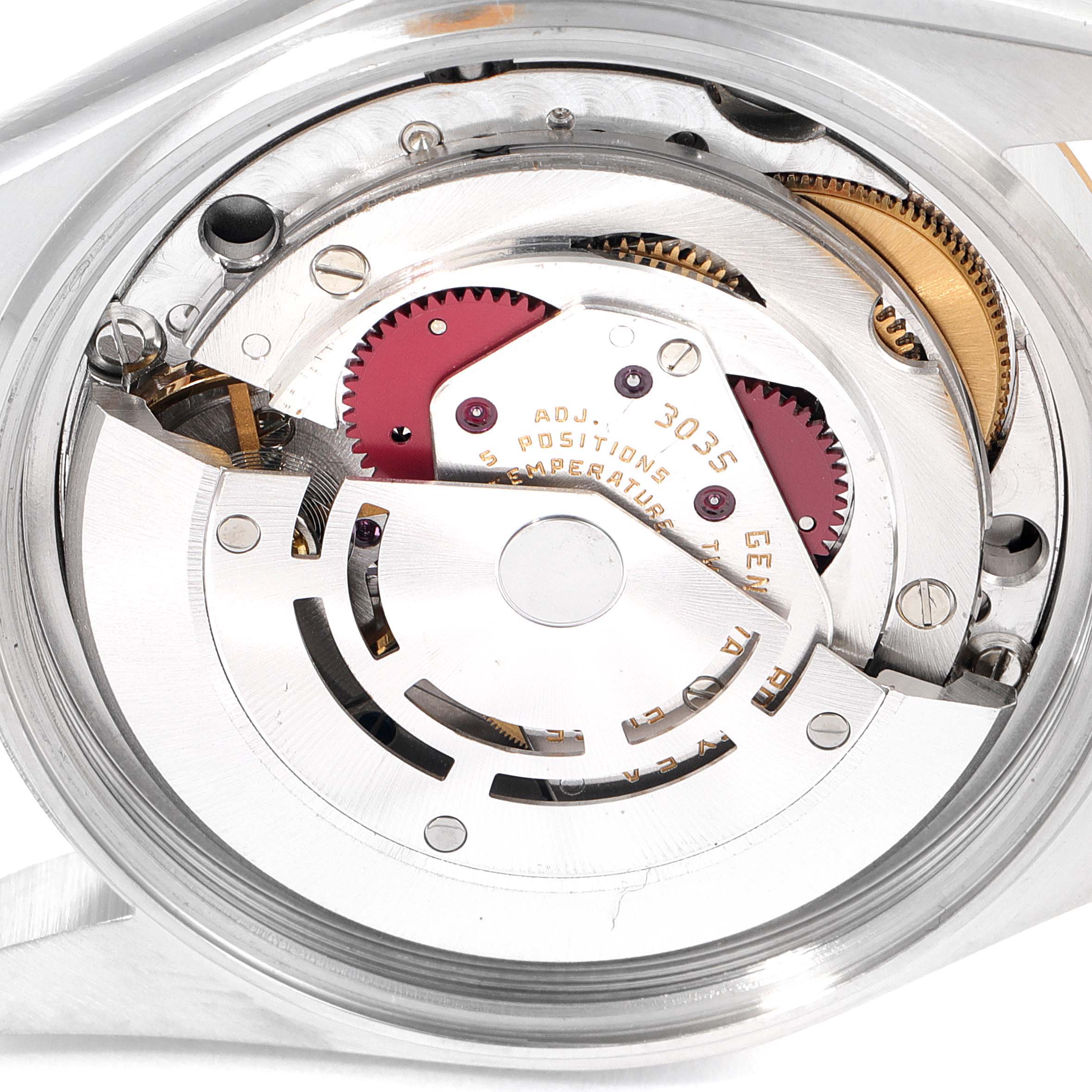 The image displays the internal movement mechanism of a Vintage Collection model by Rolex, viewed from the back case.