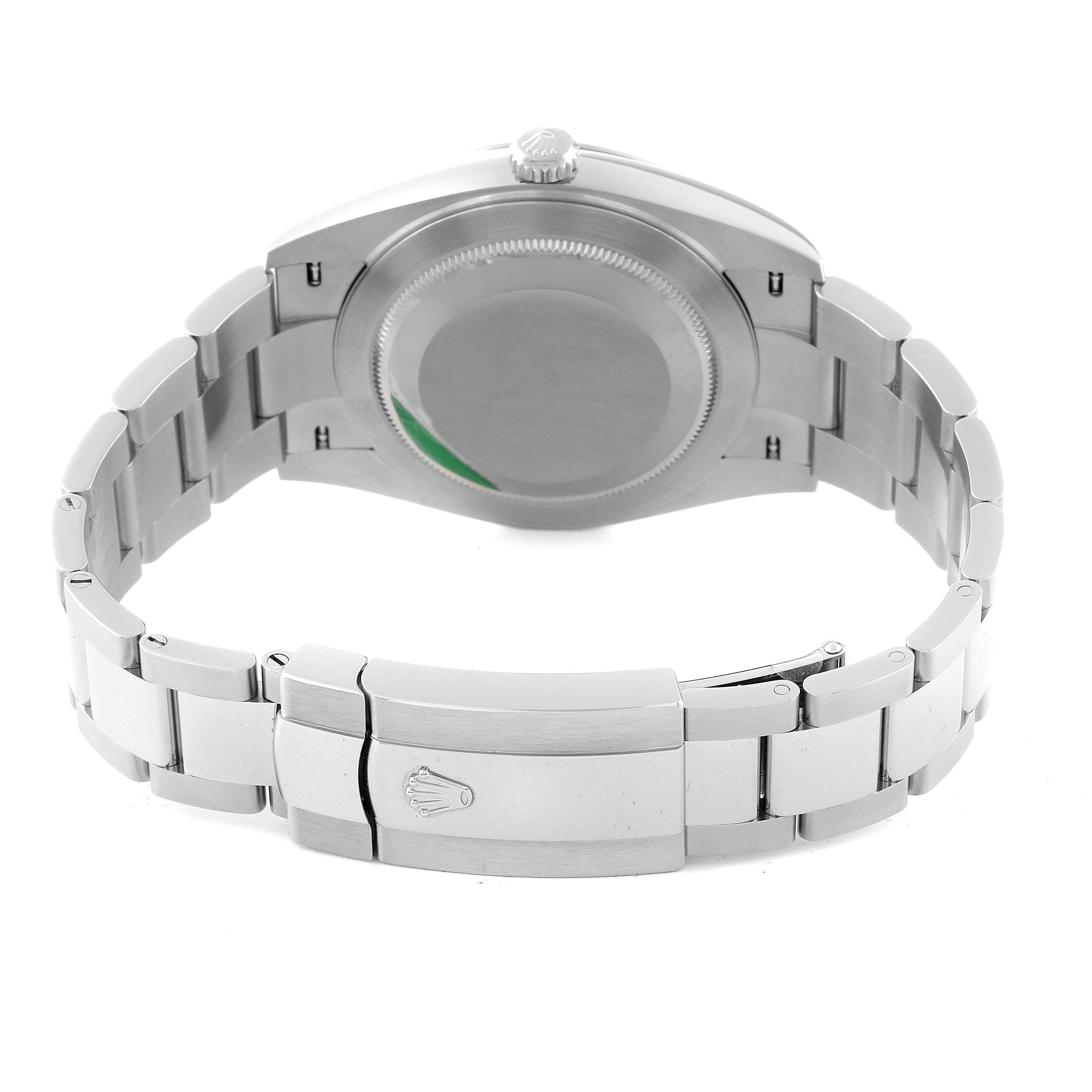 The image shows the back of a Rolex Datejust 41 126300 Men
s Stainless Steel Blue Dial 126300 Men
s Stainless Steel Blue Dial watch, highlighting the case back and the clasp with the Rolex logo.