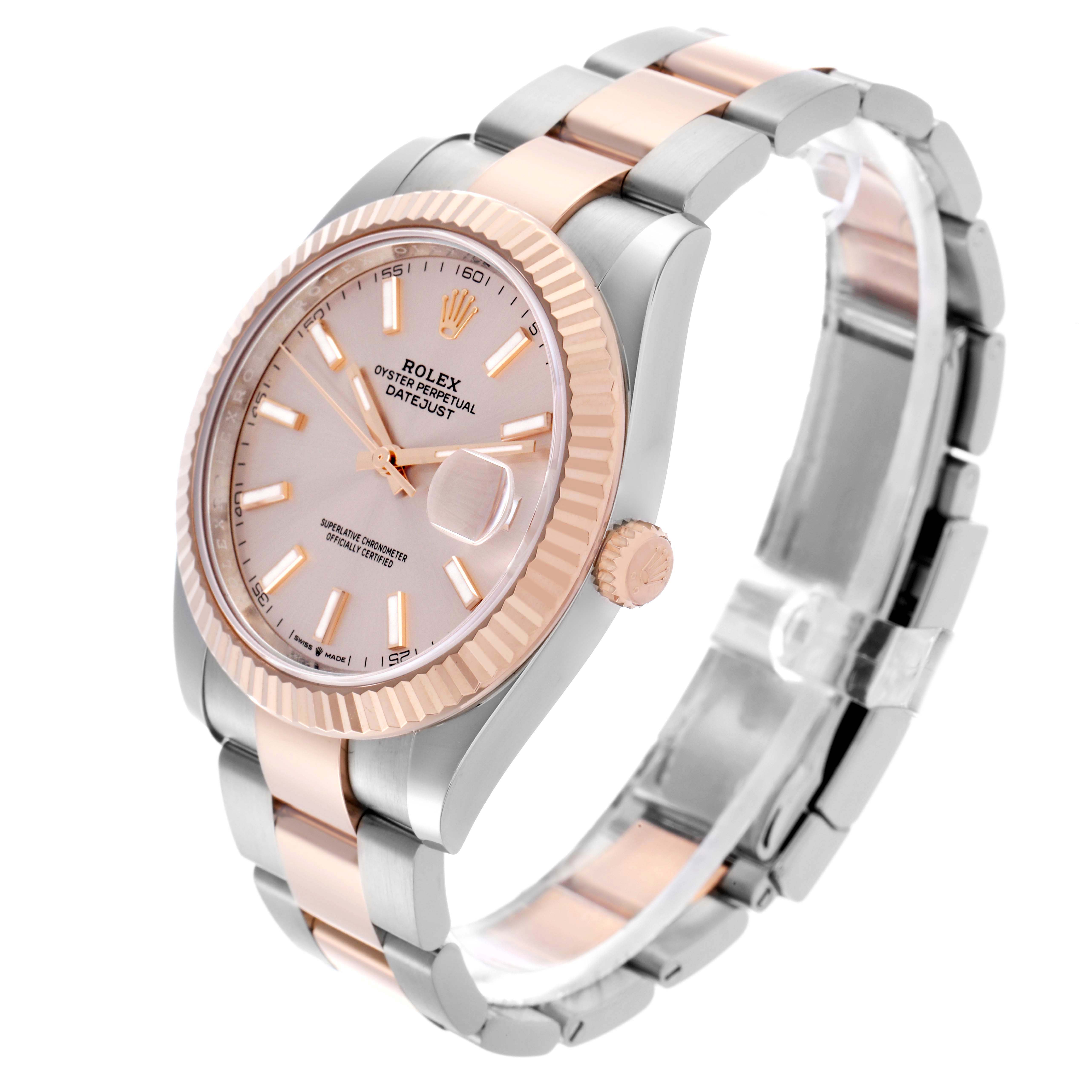 The Rolex Datejust 41 126331 Men's Steel and Gold (two tone) Pink Dial is shown from an angled side view, highlighting the dial, fluted bezel, and bracelet.