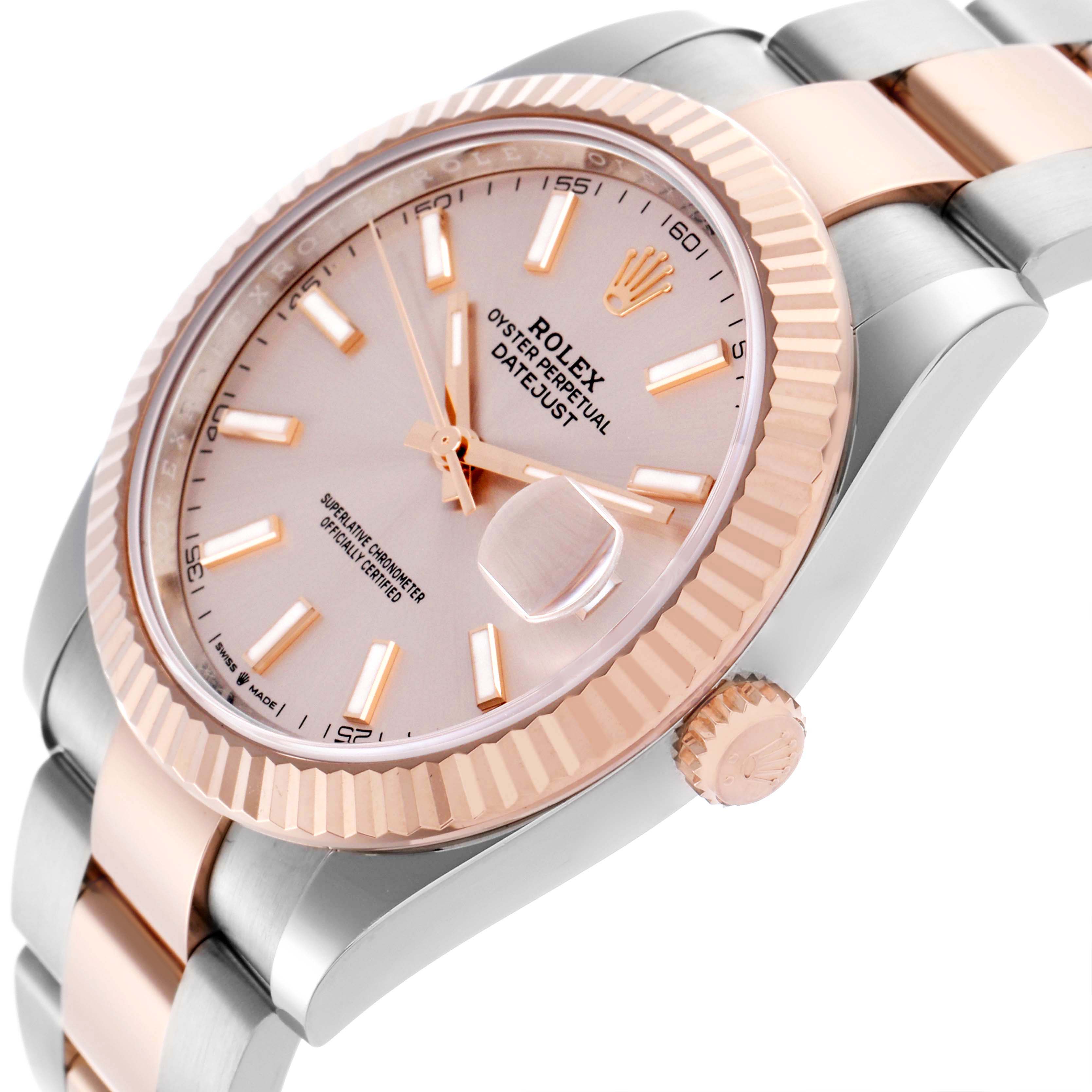 The image shows a Rolex Datejust 41 126331 Men's Steel and Gold (two tone) Pink Dial from a side angle, highlighting its dial, fluted bezel, case, and partially visible bracelet.