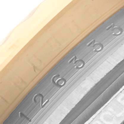 The image shows a close-up of the Rolex Datejust 41 126333 Men
s Steel and Gold (two tone) Black Dial 126333 Men
s Steel and Gold (two tone) Black Dial
s engraved bezel or inner case markings.