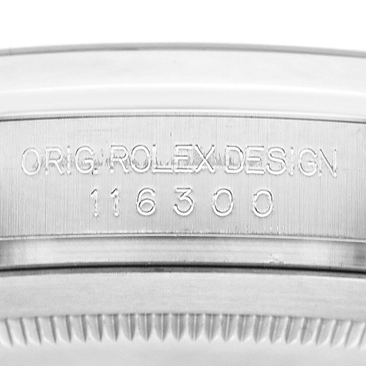 The image shows a close-up of the case edge of a Rolex Datejust 41 116300 Men's Stainless Steel Blue Dial, highlighting the model number and "ORIG ROLEX DESIGN" engraving.