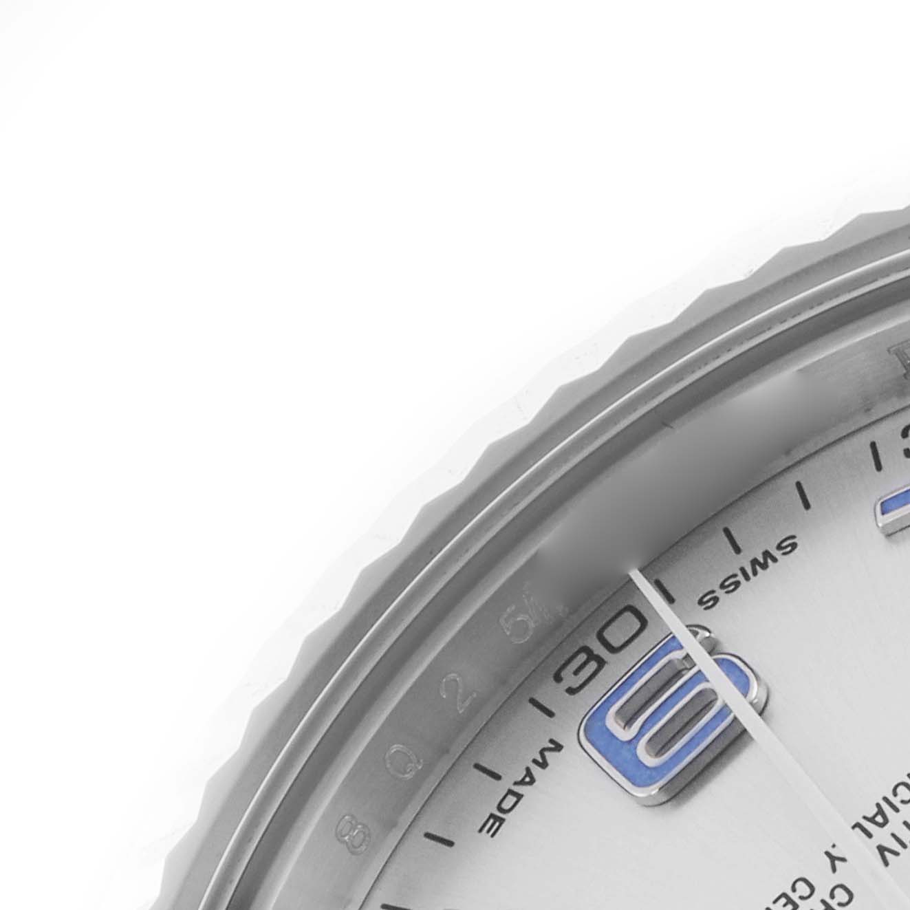 The image shows a close-up of the Rolex Datejust 41 116334 Men
s Stainless Steel Silver Dial 116334 Men
s Stainless Steel Silver Dial
s dial, focusing on the 9 o
clock marker and edge of the bezel.