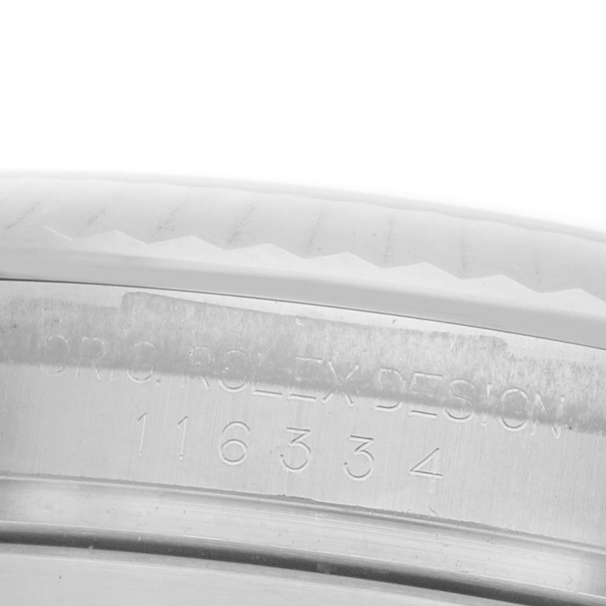 The image shows an engraved side view of the Rolex Datejust 41 116334 Men
s Stainless Steel Silver Dial 116334 Men
s Stainless Steel Silver Dial, focusing on the case
s model number details.