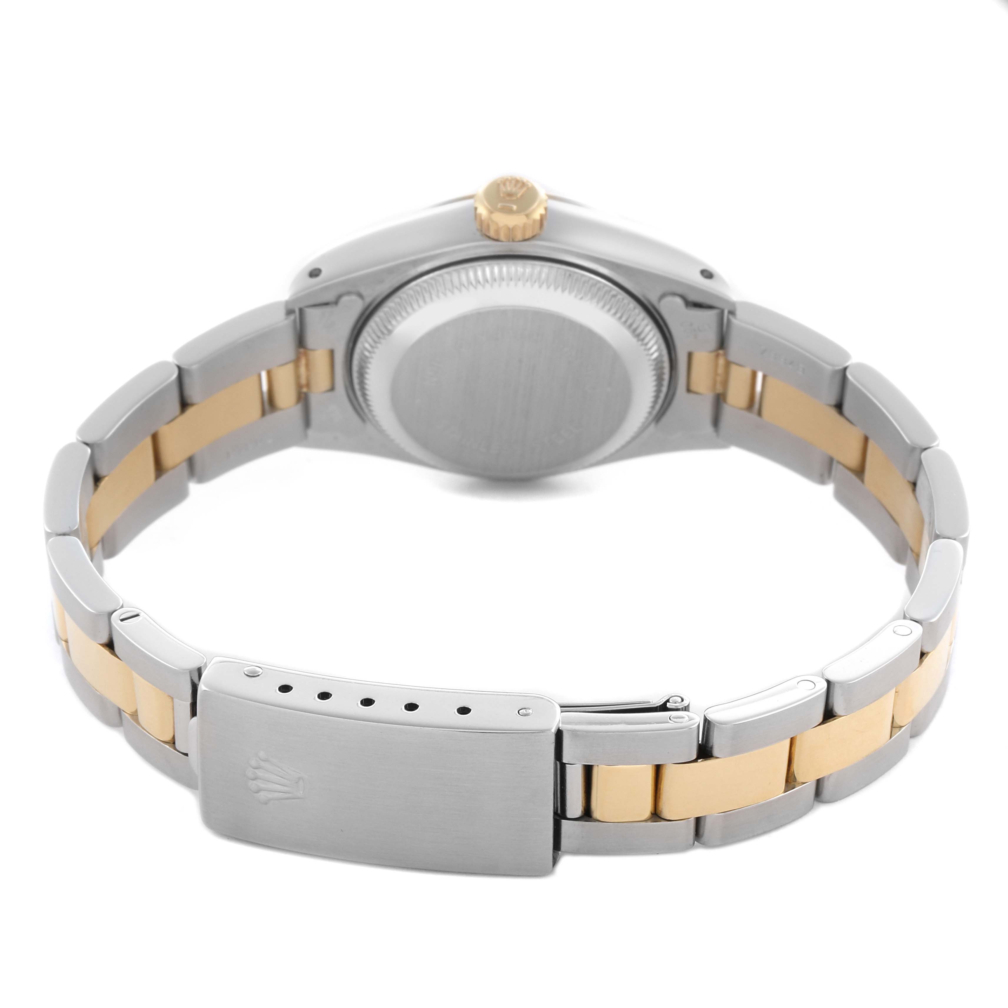 The Rolex Datejust 69163 Women's Steel and Gold (two tone) Champagne Dial 69163 Women's Steel and Gold (two tone) Champagne Dial watch is shown from the back, featuring its case back, crown, and two-tone bracelet with a clasp.