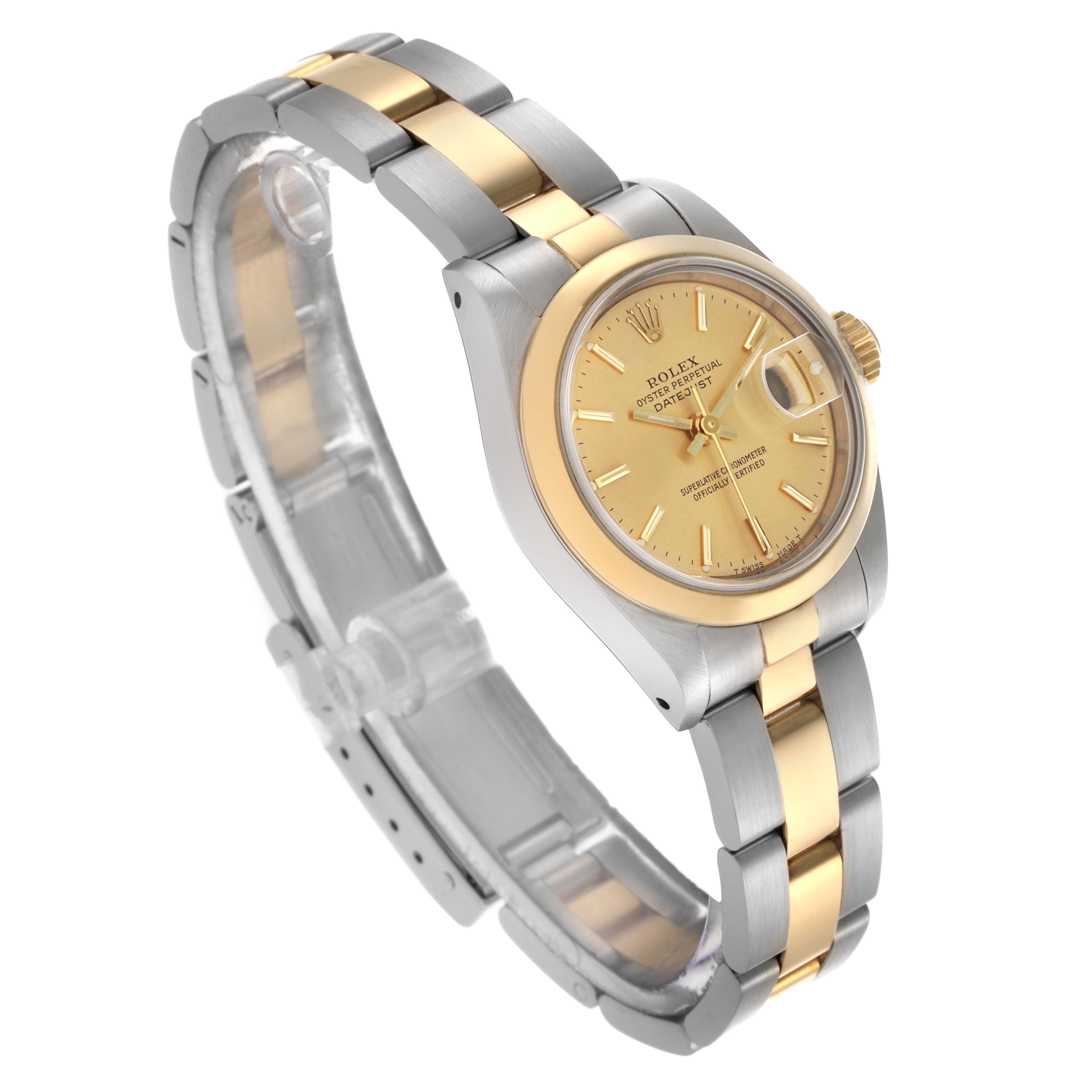 The Rolex Datejust 69163 Women's Steel and Gold (two tone) Champagne Dial 69163 Women's Steel and Gold (two tone) Champagne Dial watch is shown at an angled view, displaying its two-tone bracelet, bezel, and dial with a date window.