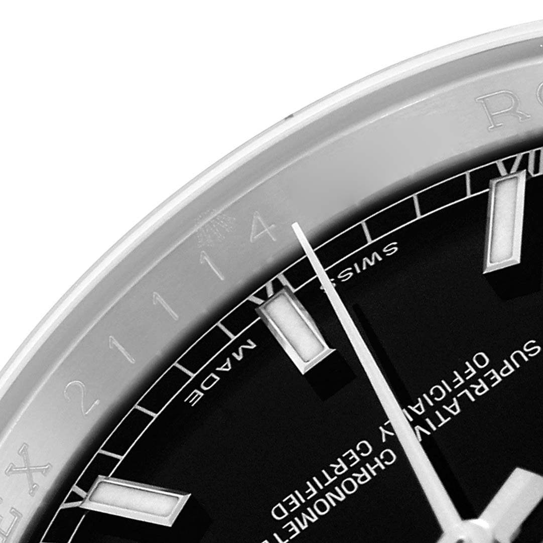 The image shows a close-up of the Rolex Datejust 116234 Men's Stainless Steel Black Dial 116234 Men's Stainless Steel Black Dial watch, focusing on the dial, indices, and part of the bezel.