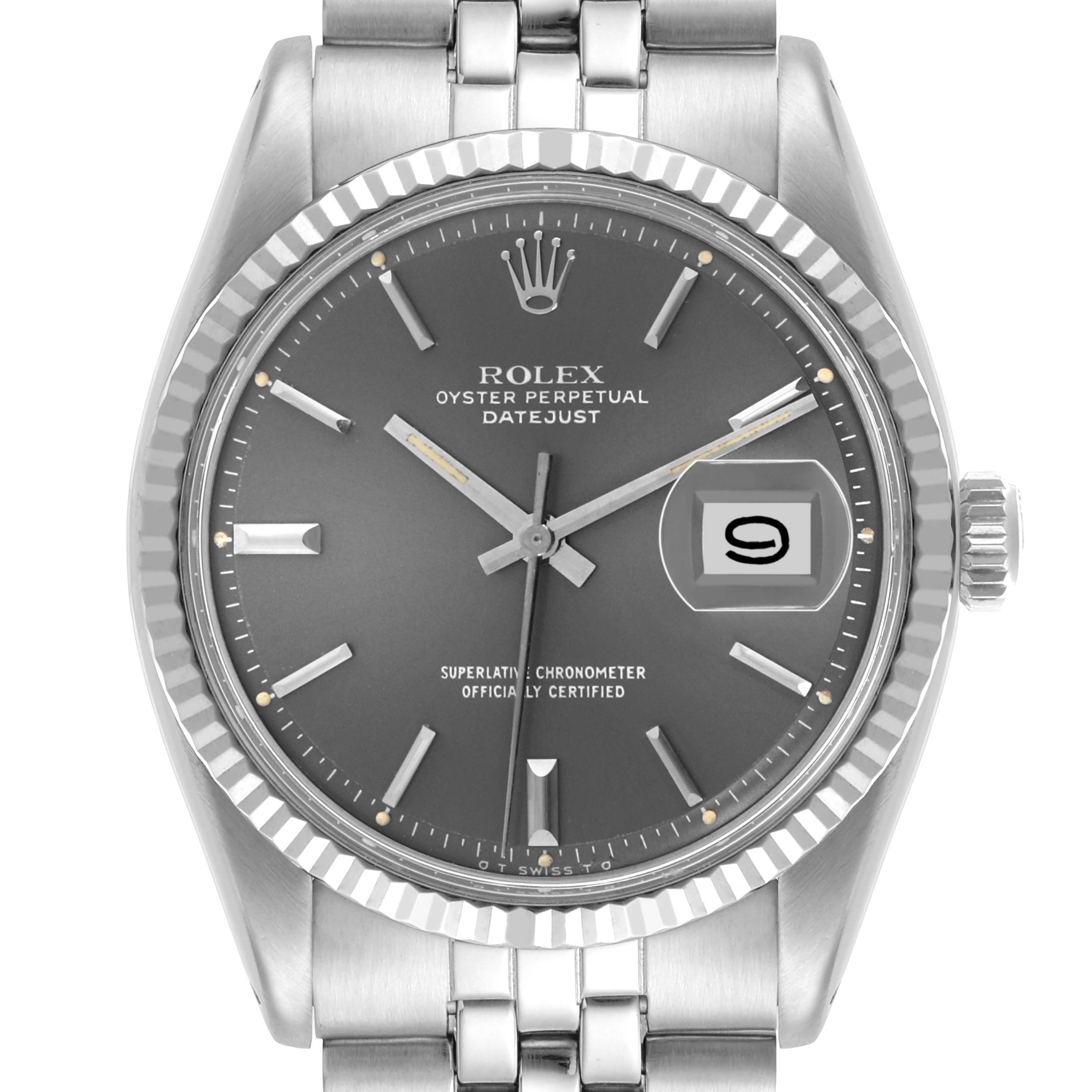 The Rolex Datejust 1601 Men's Stainless Steel Grey Dial 1601 Men's Stainless Steel Grey Dial watch is shown from a front angle, displaying the dial, fluted bezel, and part of the bracelet.