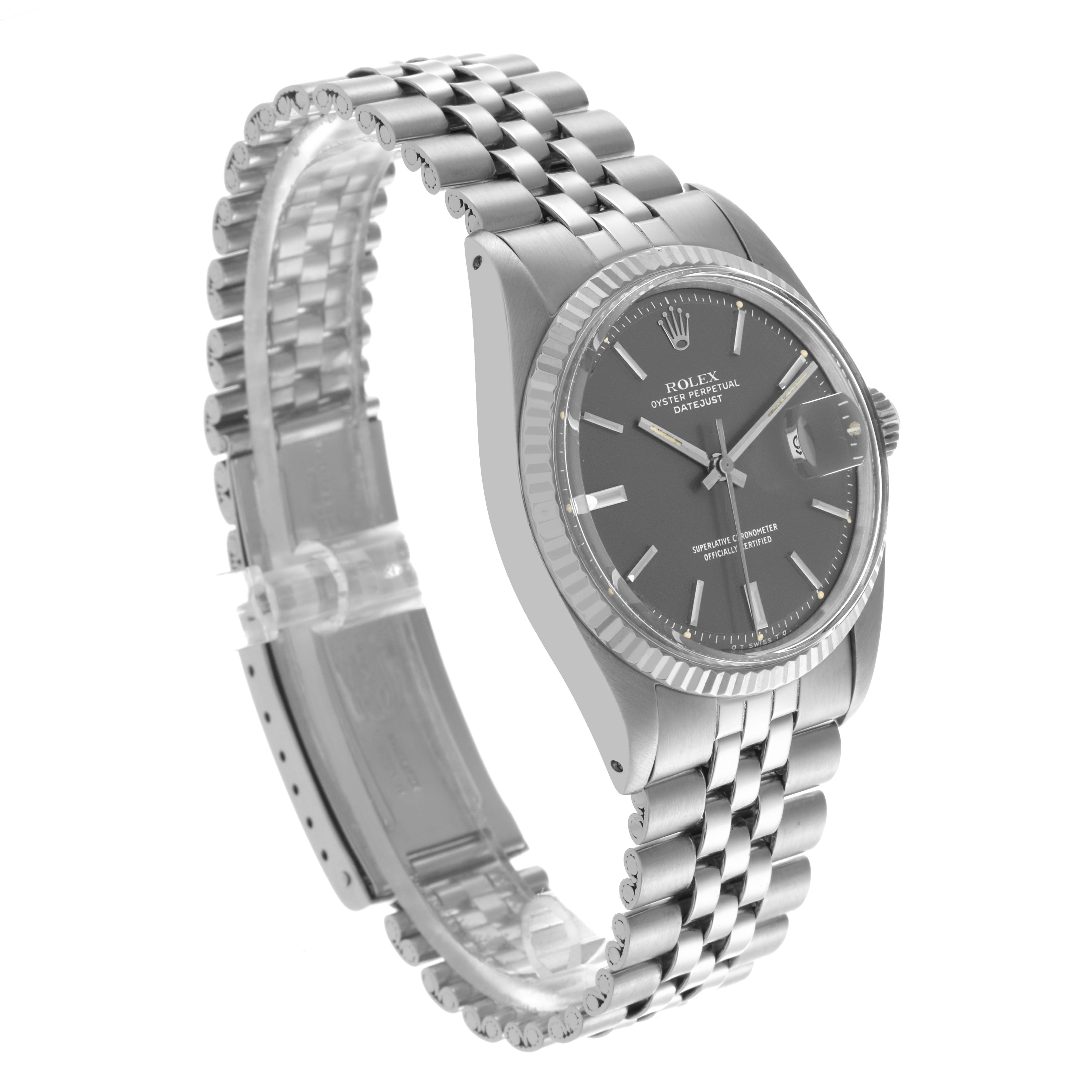The Rolex Datejust 1601 Men's Stainless Steel Grey Dial 1601 Men's Stainless Steel Grey Dial watch is shown at an angled perspective, highlighting the face, fluted bezel, and Jubilee bracelet.