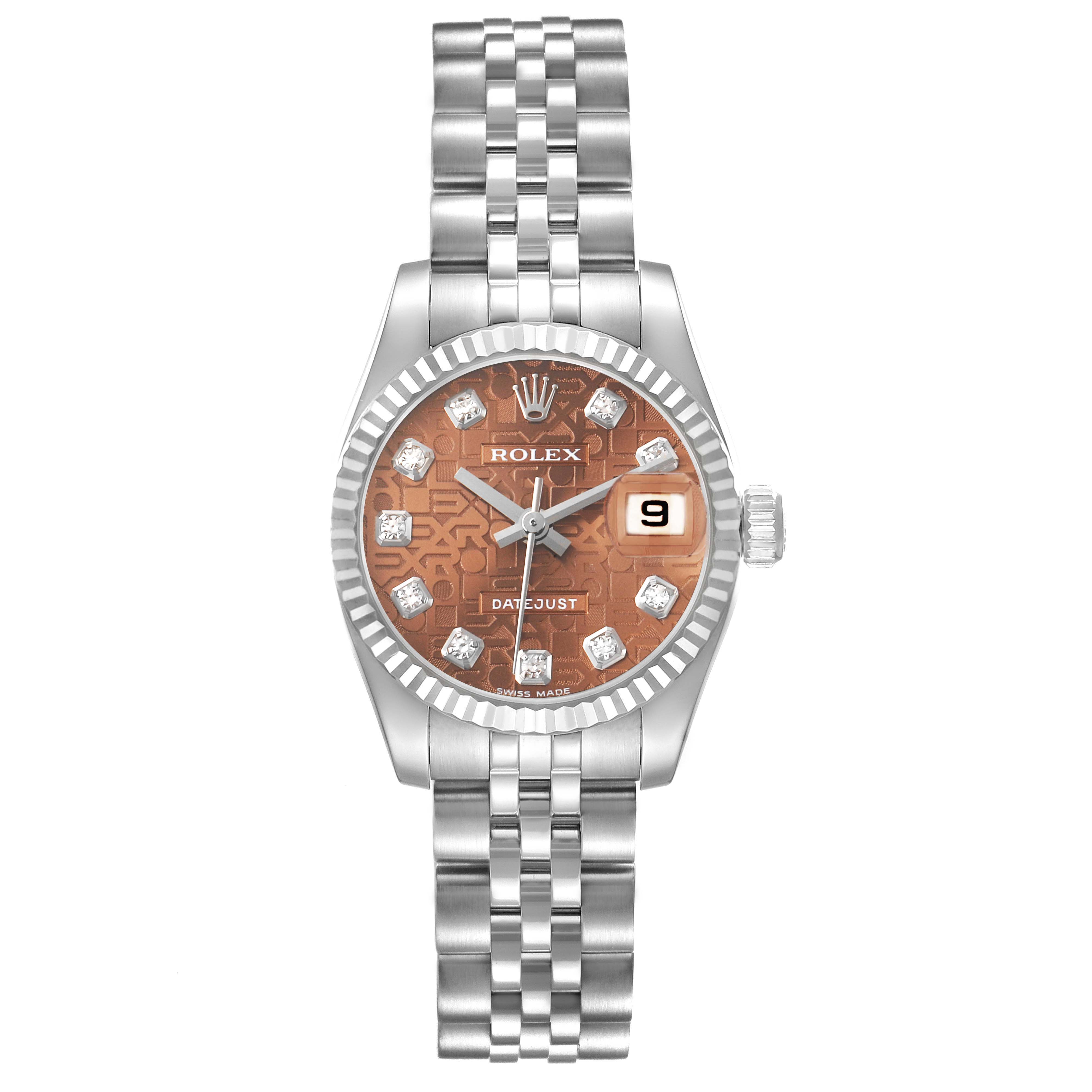 The Rolex Datejust 179174 Women's Stainless Steel Pink Dial watch is shown from a top-down angle, highlighting its bracelet, bezel, and dial with date display.