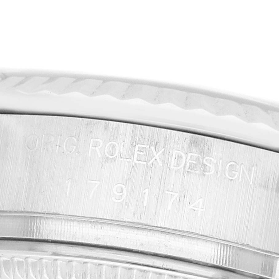 The image shows a close-up of the side of the Rolex Datejust 179174 Women's Stainless Steel Pink Dial, focusing on the engraved model number.