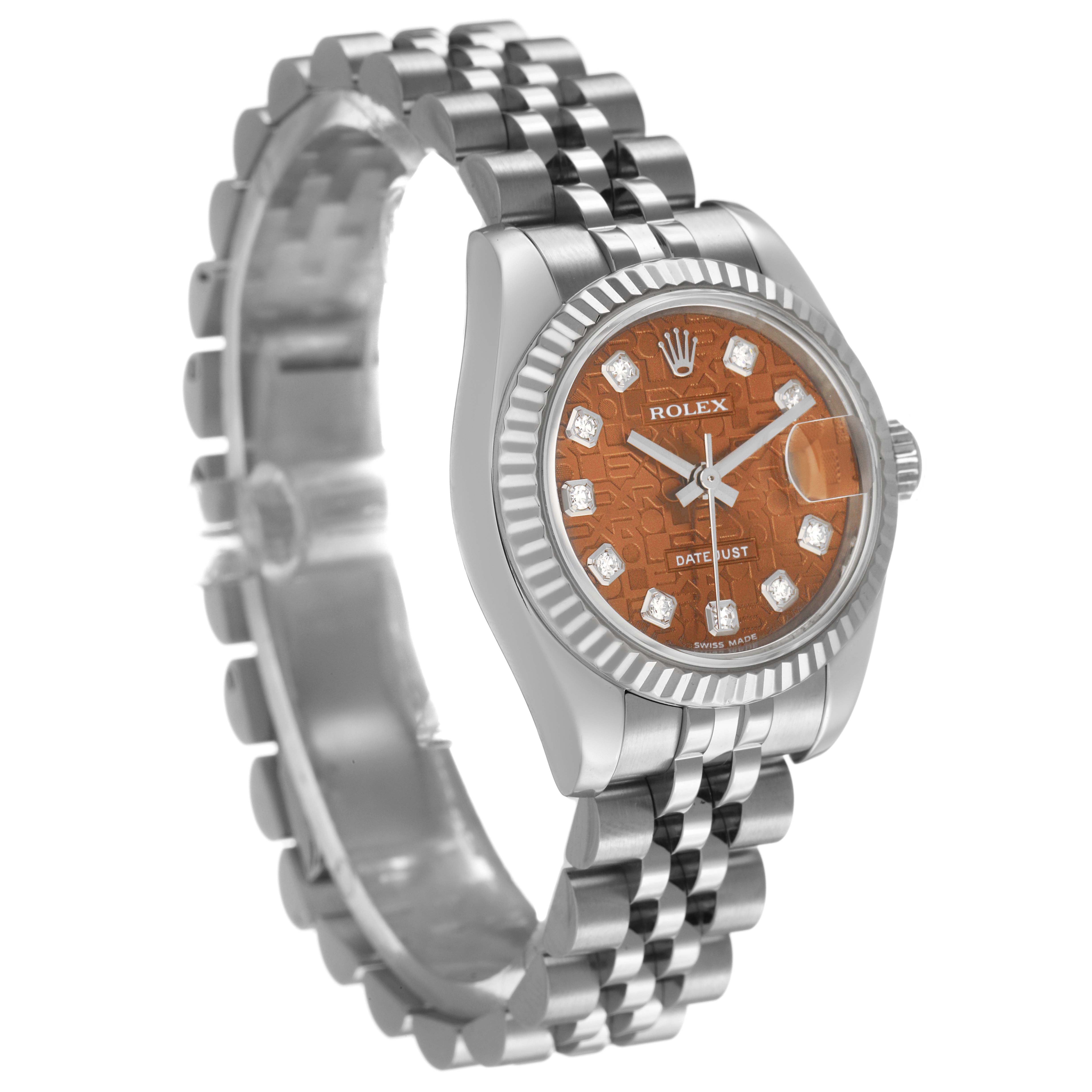 The Rolex Datejust 179174 Women's Stainless Steel Pink Dial watch is shown from a front angle, highlighting the face, bezel, and part of the bracelet.
