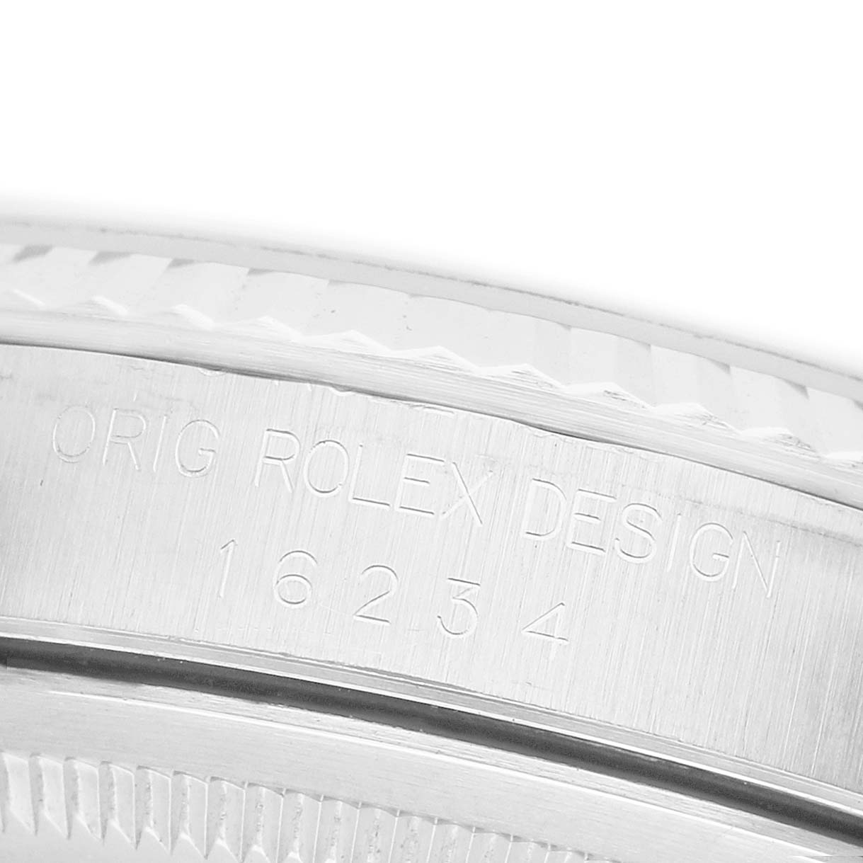 The image shows an engraved side view of a Rolex Datejust 16234 Men's Steel and Gold (two tone) Silver Dial bezel with model details.