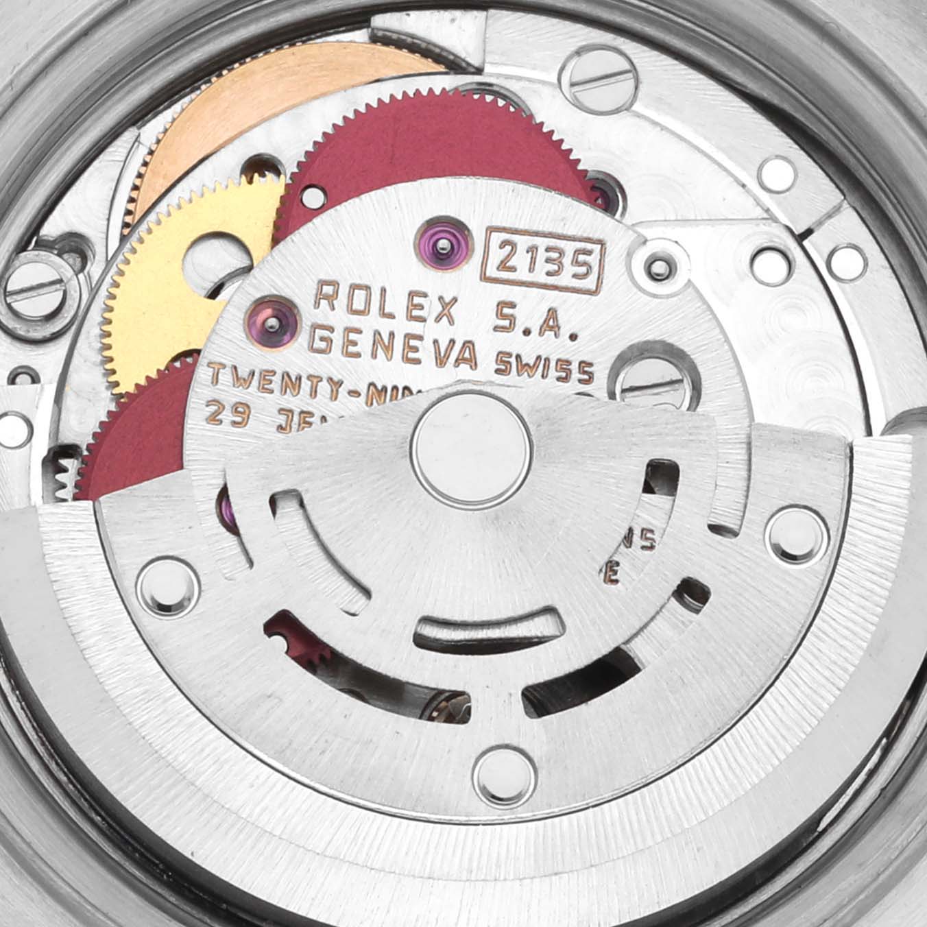 The image shows the internal movement of a Rolex Datejust 69173 Women's Steel and Gold (two tone) Black Dial 69173 Women's Steel and Gold (two tone) Black Dial, highlighting gears and the rotor from a top-down angle.