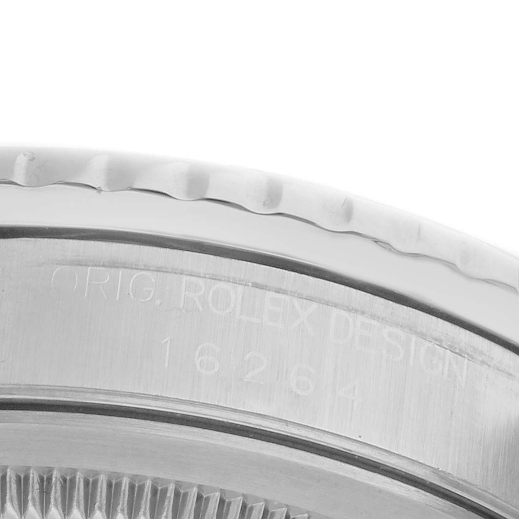 The image shows a close-up of the bezel edge and case side of a Rolex Turn-o-Graph 16264 Men's Stainless Steel White Dial 16264 Men's Stainless Steel White Dial watch, highlighting engraved details.