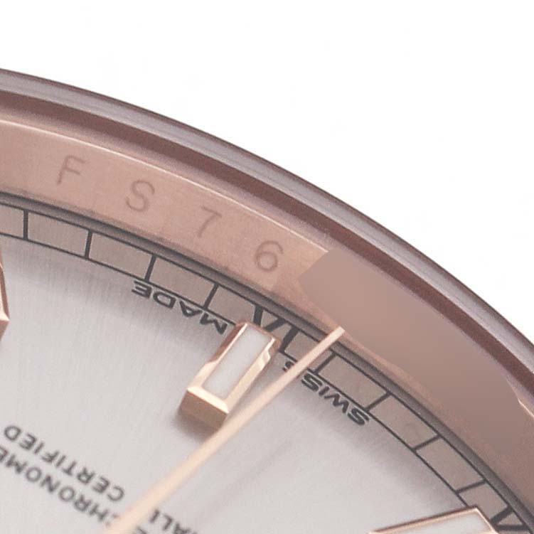 The image shows a close-up of the Rolex President 118135 Men's Rose Gold Silver Dial watch's dial and serial number area along the inner bezel.
