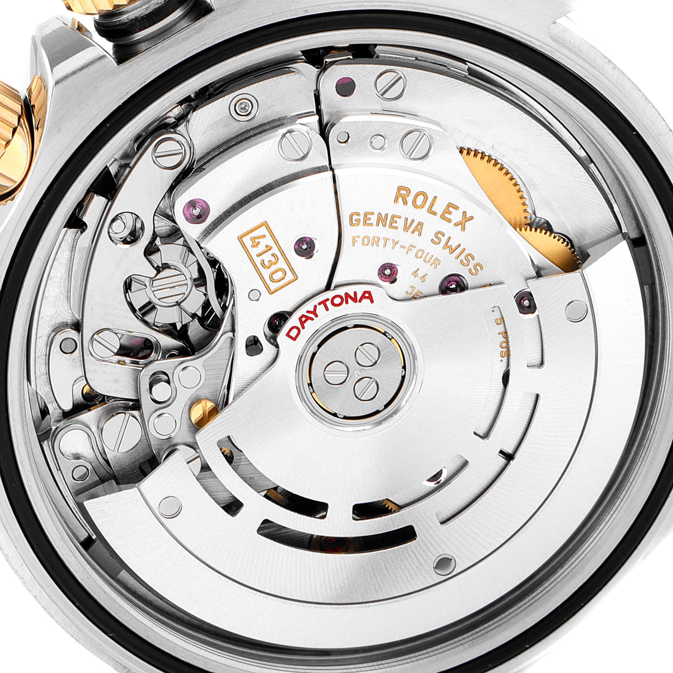 The image shows a close-up view of the Rolex Daytona 116523 Men's Steel and Gold (two tone) Blue Dial 116523 Men's Steel and Gold (two tone) Blue Dial model's intricate watch movement and internal mechanisms.