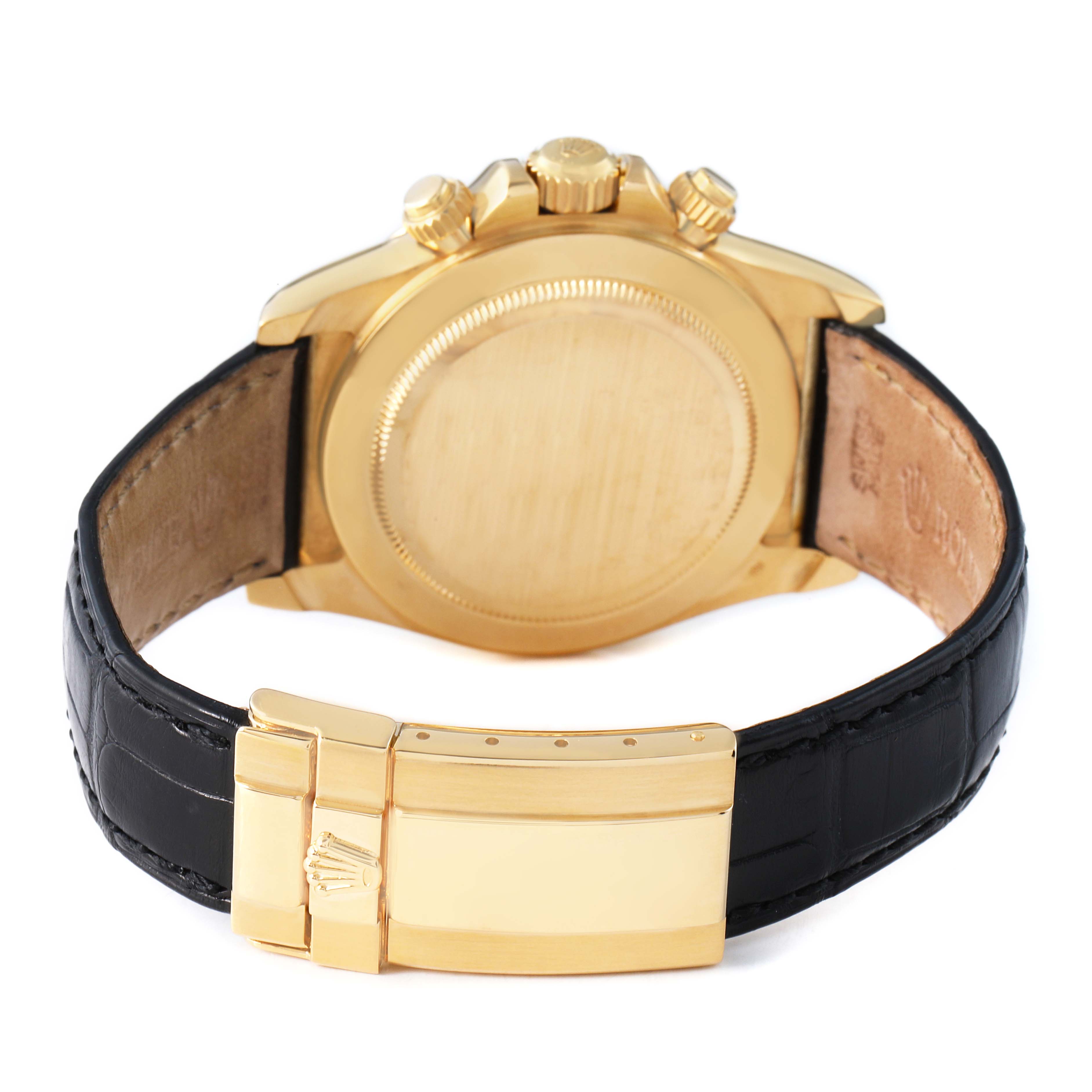 The Rolex Daytona 16518 Men's Yellow Gold White Dial watch is shown from the back, displaying the case back, crown, pushers, and clasp on a leather strap.